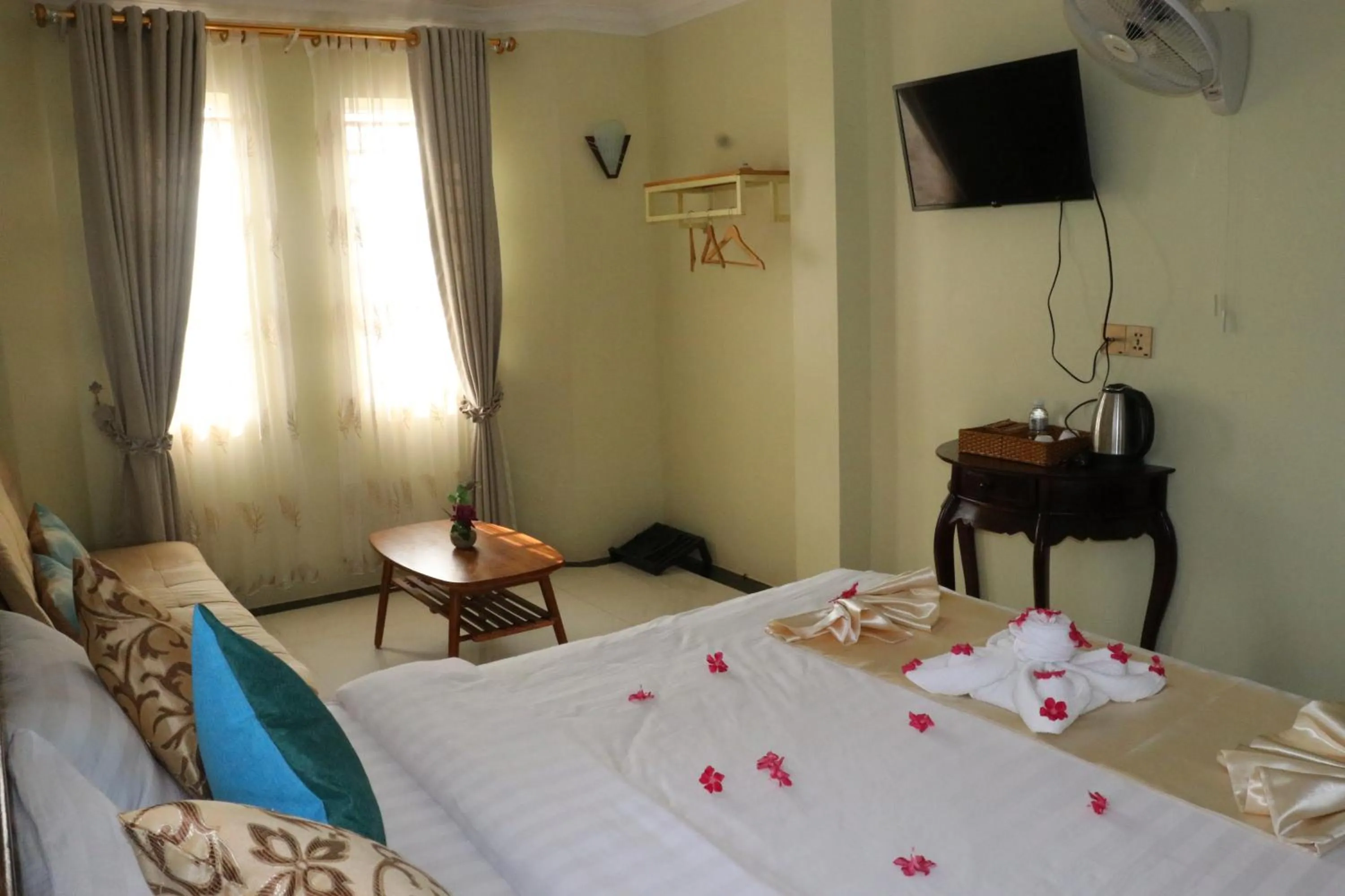 Bed in AHHA Boutique Kampot