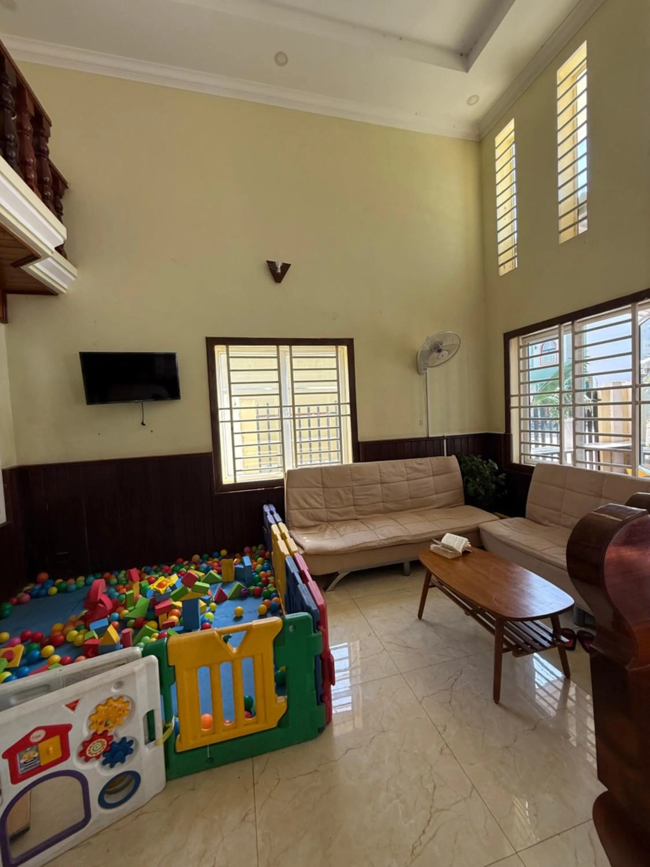 Communal lounge/ TV room in AHHA Boutique Kampot