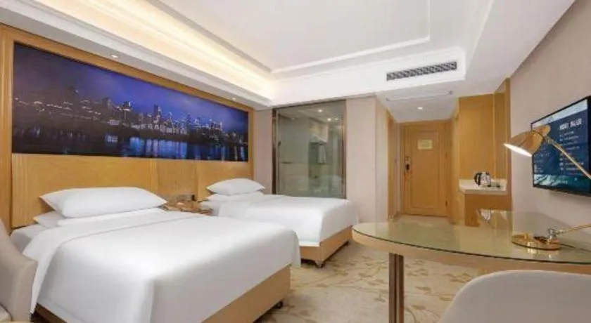 Bed in Vienna Hotel Chongqing Yongchuan High-Speed Railway Station Xinglong Lake
