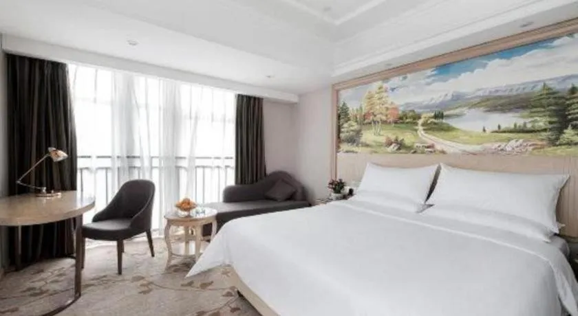 Bed in Vienna Hotel Chongqing Yongchuan High-Speed Railway Station Xinglong Lake