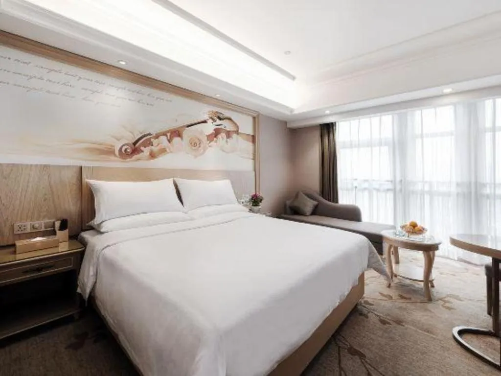 Bed in Vienna Hotel Chongqing Yongchuan High-Speed Railway Station Xinglong Lake