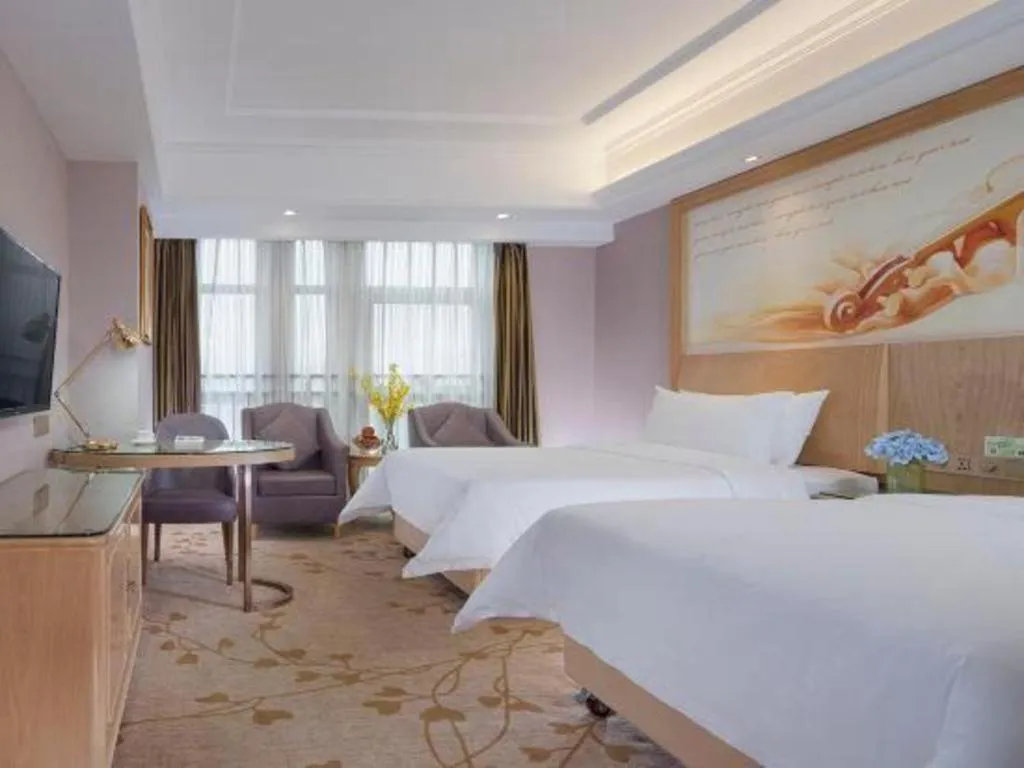 Bed in Vienna Hotel Chongqing Yongchuan High-Speed Railway Station Xinglong Lake