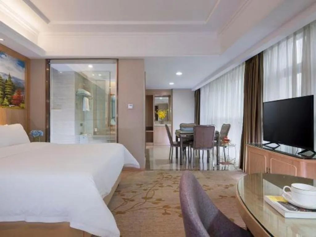 Bed in Vienna Hotel Chongqing Yongchuan High-Speed Railway Station Xinglong Lake