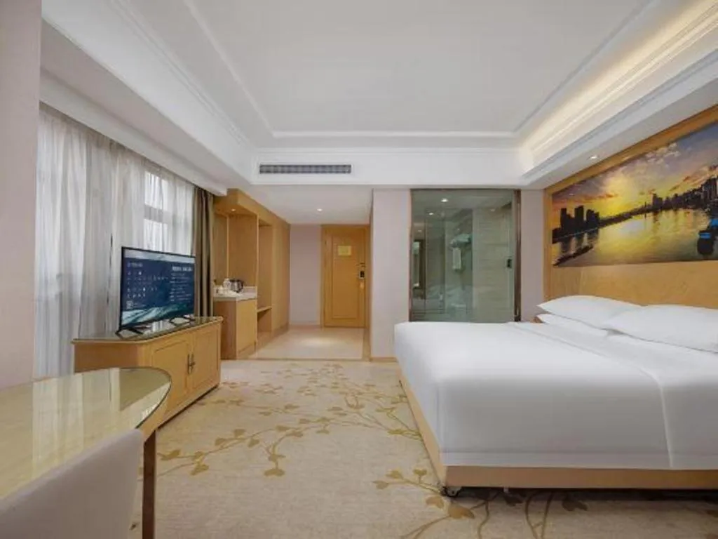 Bed in Vienna Hotel Chongqing Yongchuan High-Speed Railway Station Xinglong Lake