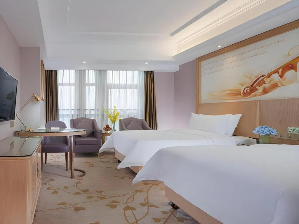 Bed in Vienna Hotel Chongqing Yongchuan High-Speed Railway Station Xinglong Lake