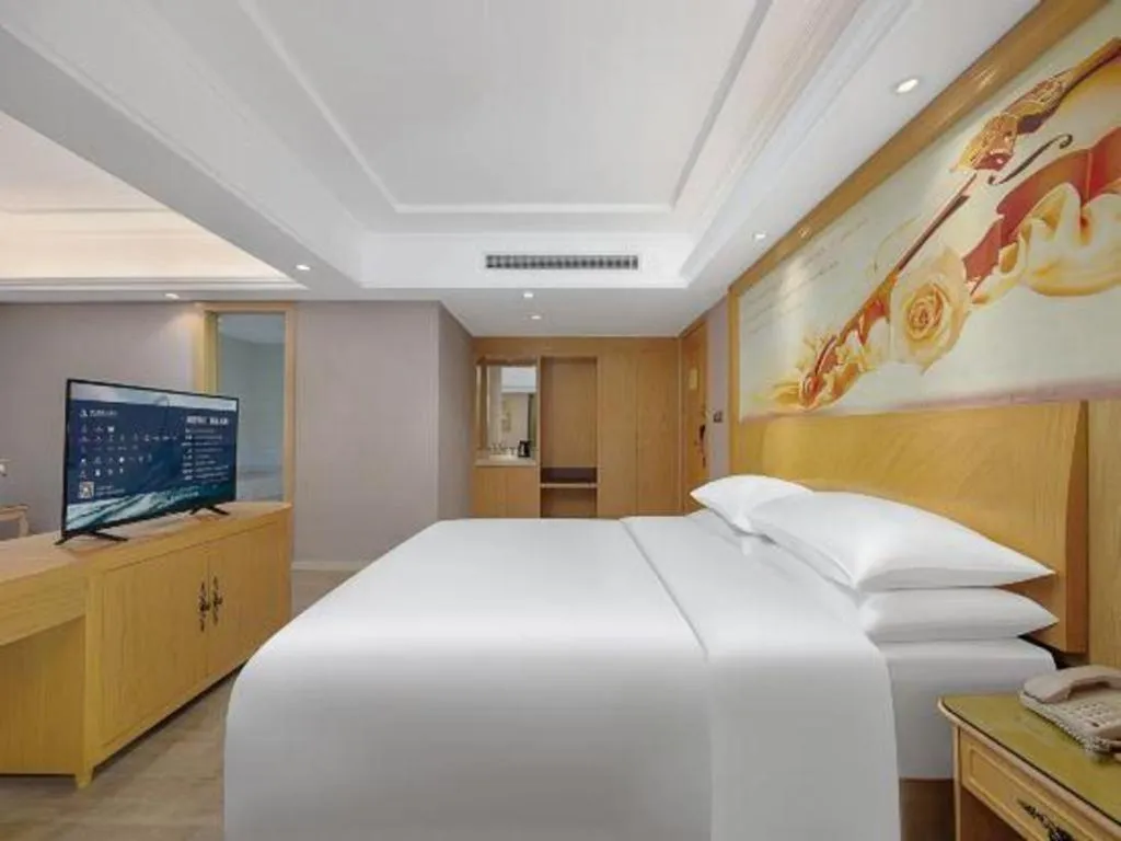 Bed in Vienna Hotel Chongqing Yongchuan High-Speed Railway Station Xinglong Lake