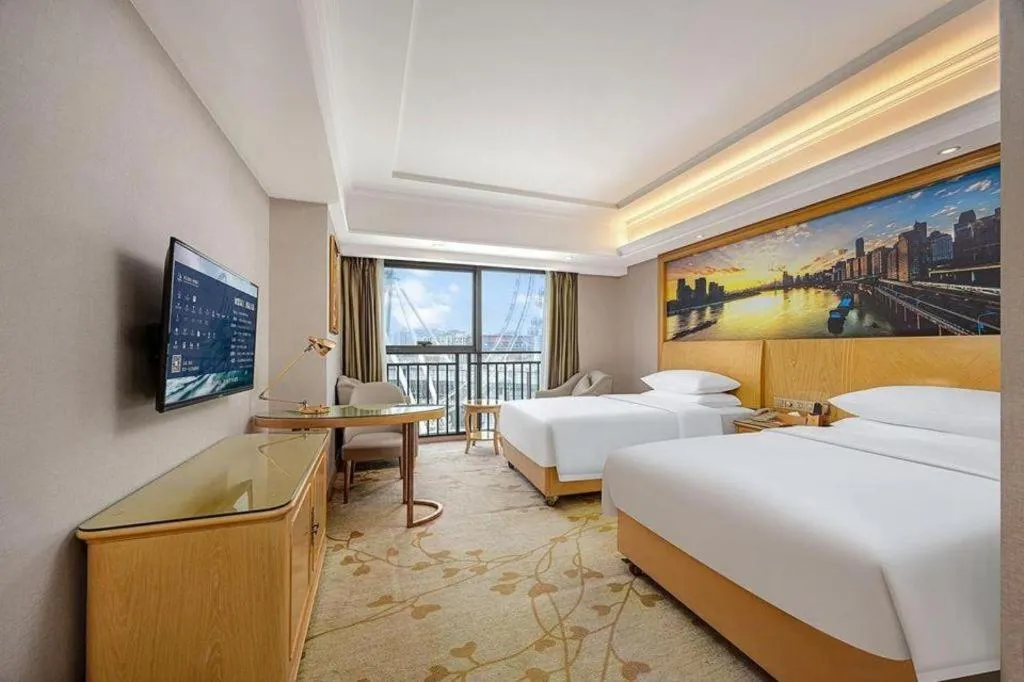 Bed in Vienna Hotel Chongqing Yongchuan High-Speed Railway Station Xinglong Lake