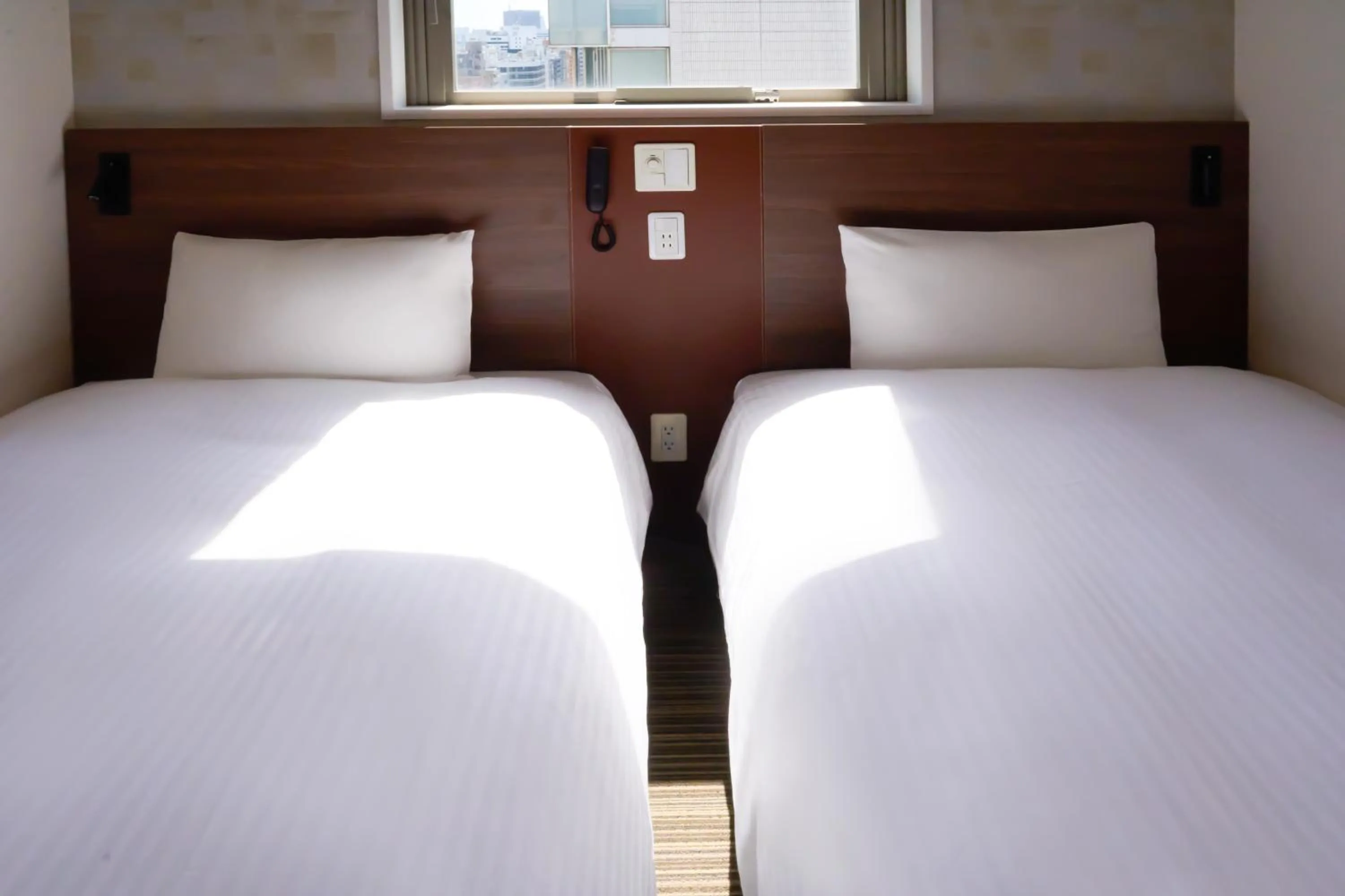 Bed in Nplus HOTEL Tokyo Nihonbashi