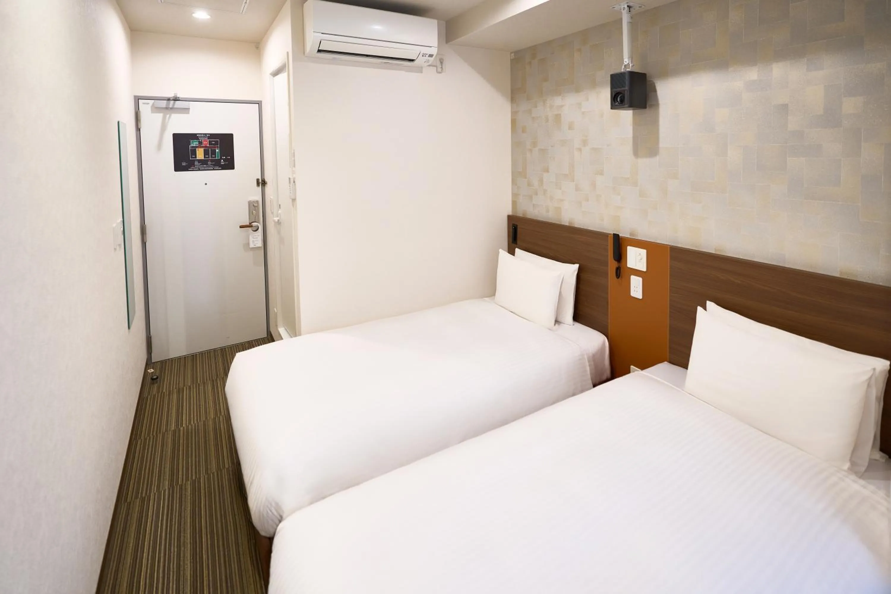 Bed in Nplus HOTEL Tokyo Nihonbashi