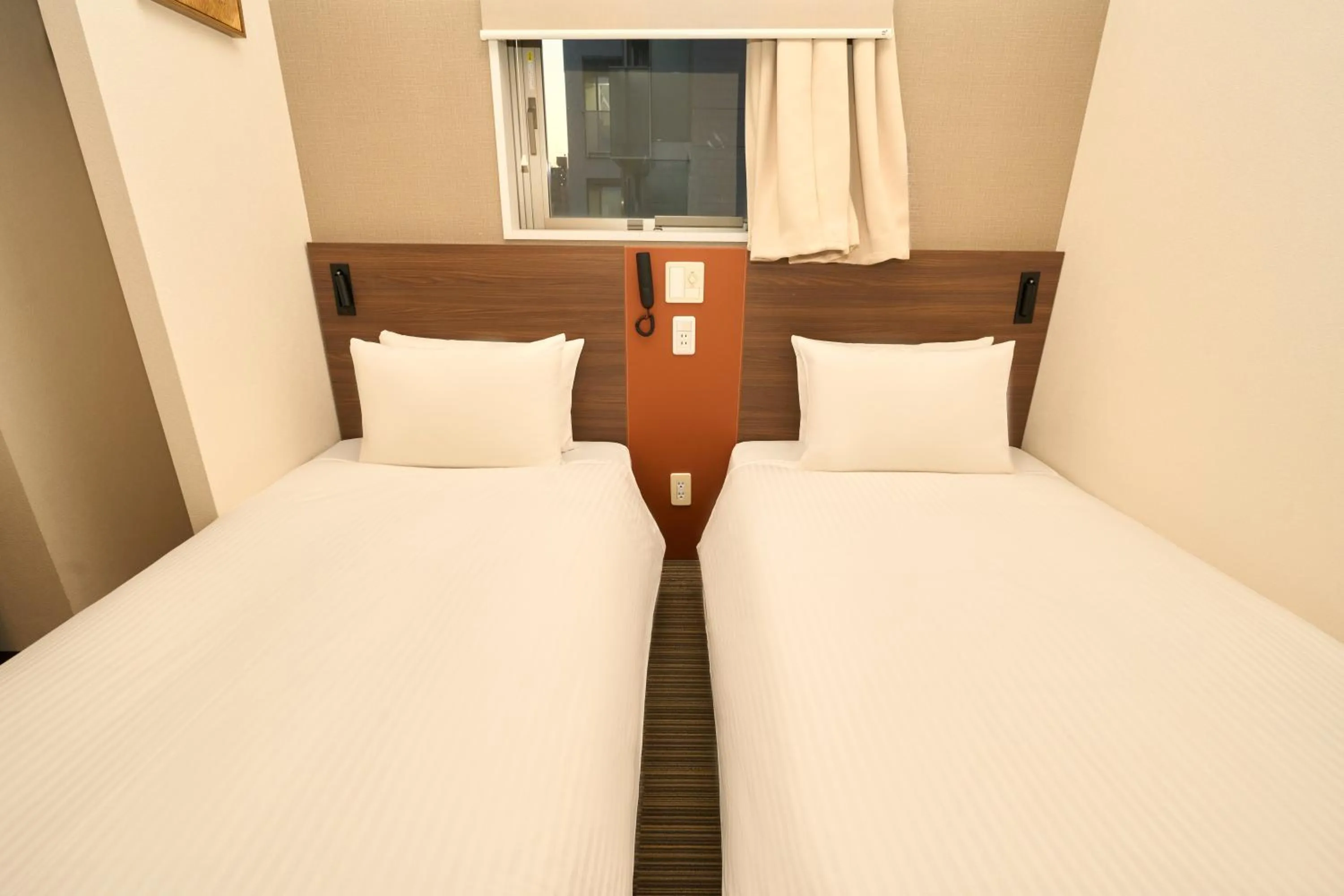 Bed in Nplus HOTEL Tokyo Nihonbashi