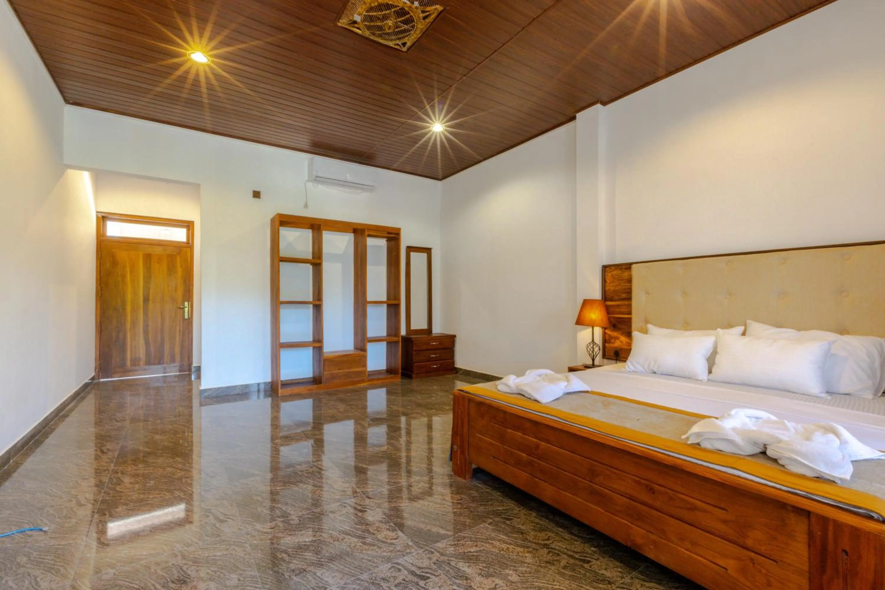 Bed in Elysia Sigiriya Hotel