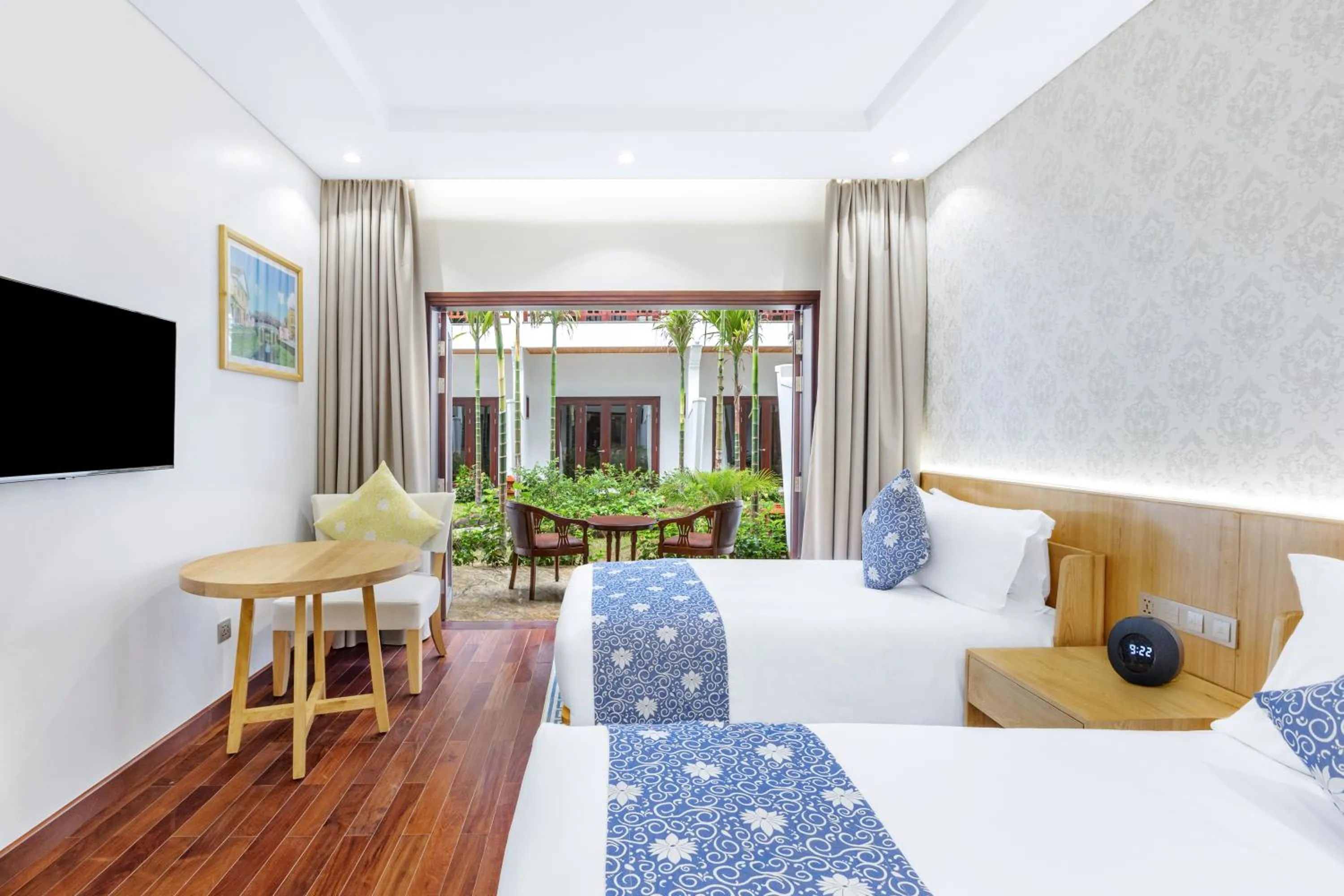 Communal lounge/ TV room, Bed in Wafaifo Resort Hoi An