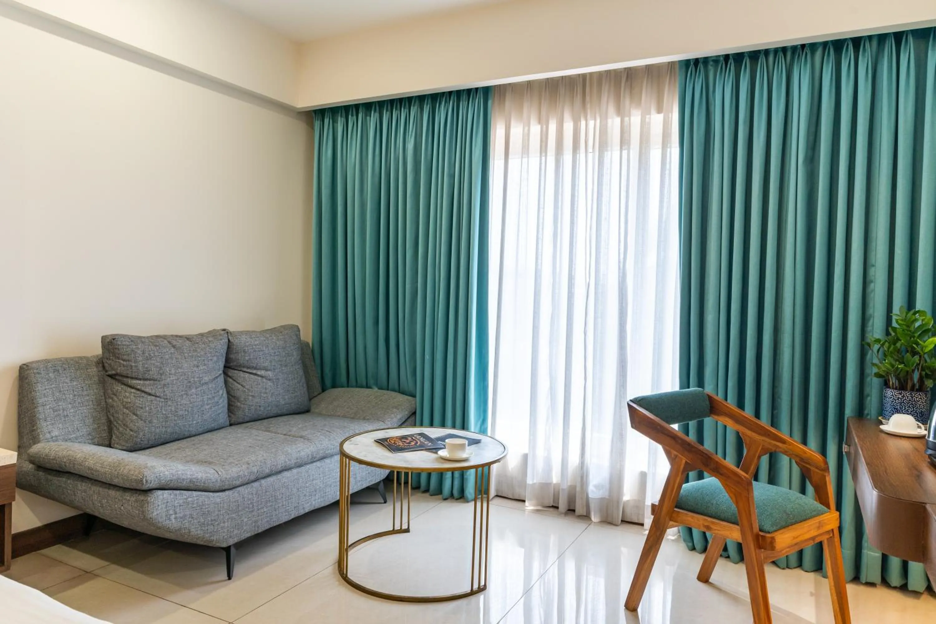 Seating area in Pincode Hotels by Yatri Nivas