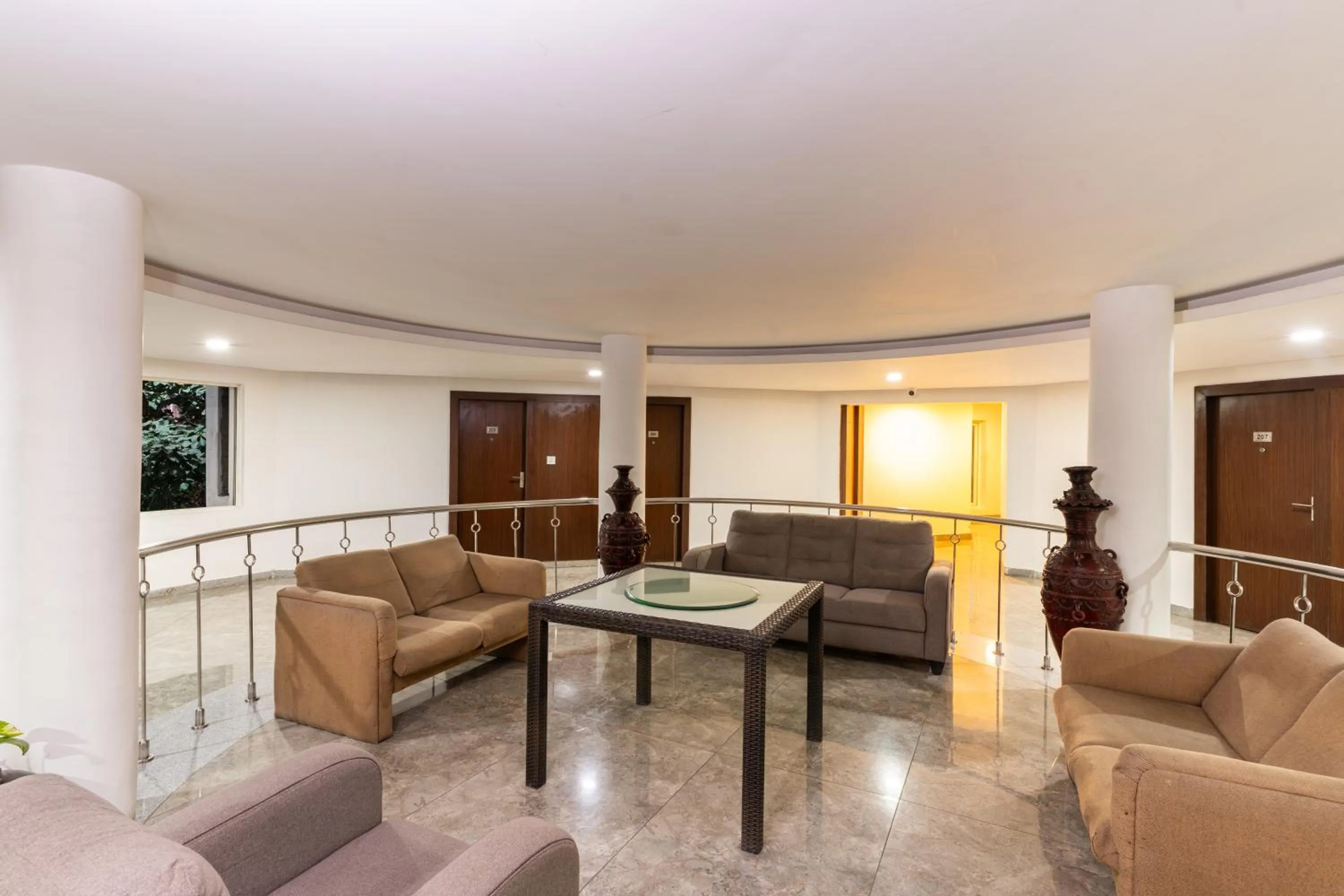 Seating area in Pincode Hotels by Yatri Nivas