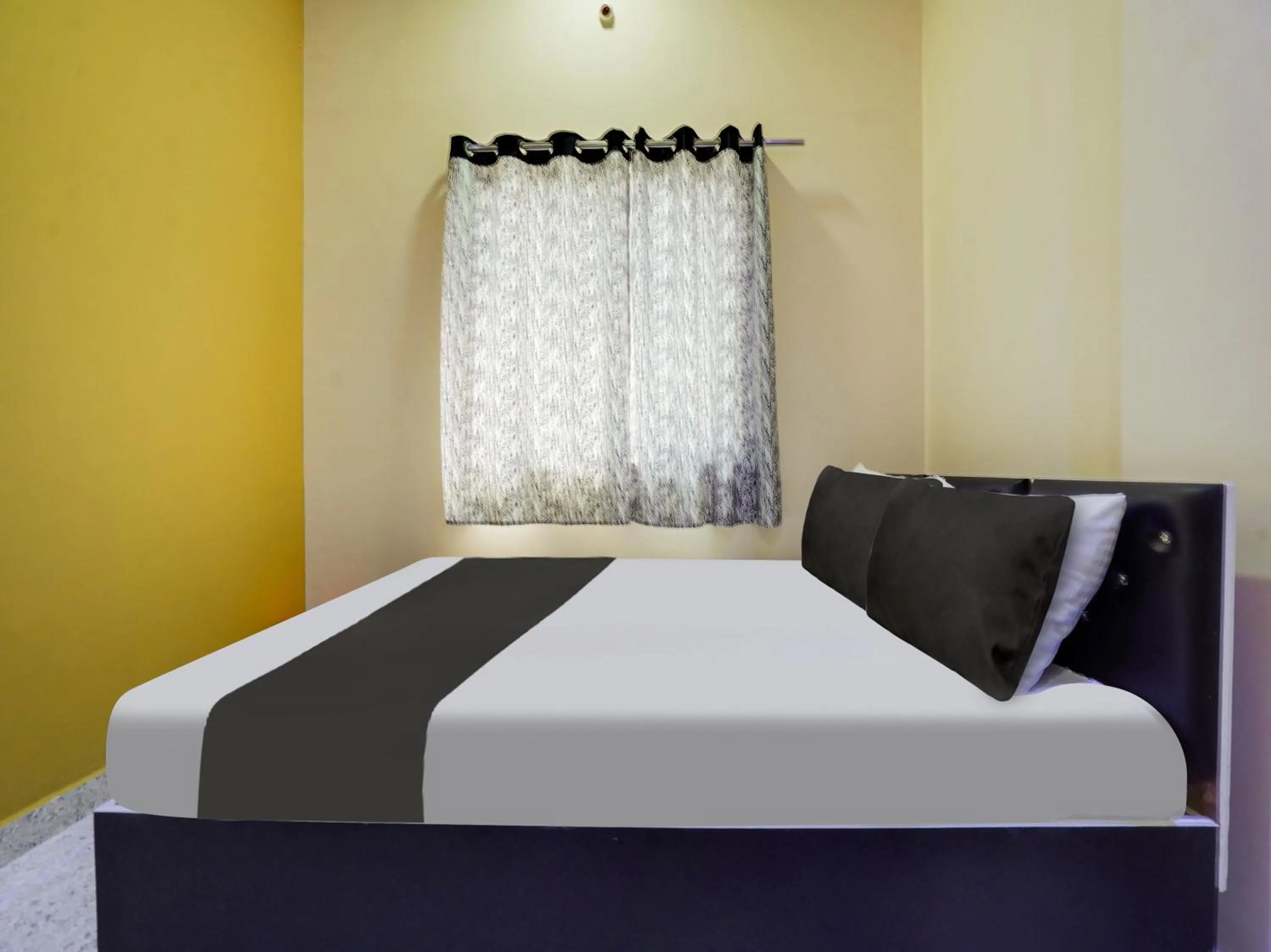 Bedroom in Hotel O RK