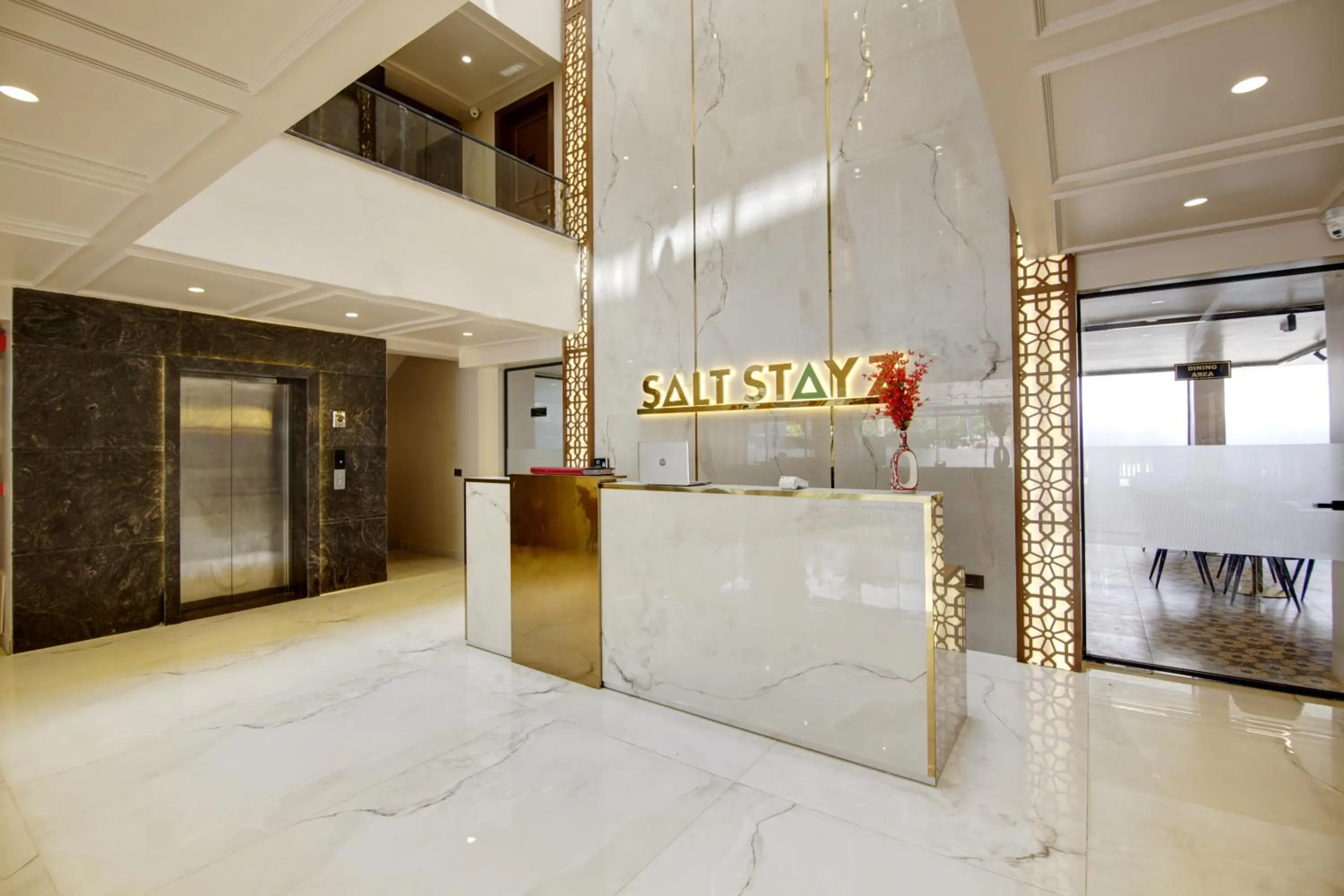 Property logo or sign in Saltstayz Premier - Near Golf Course Road & Sector 57