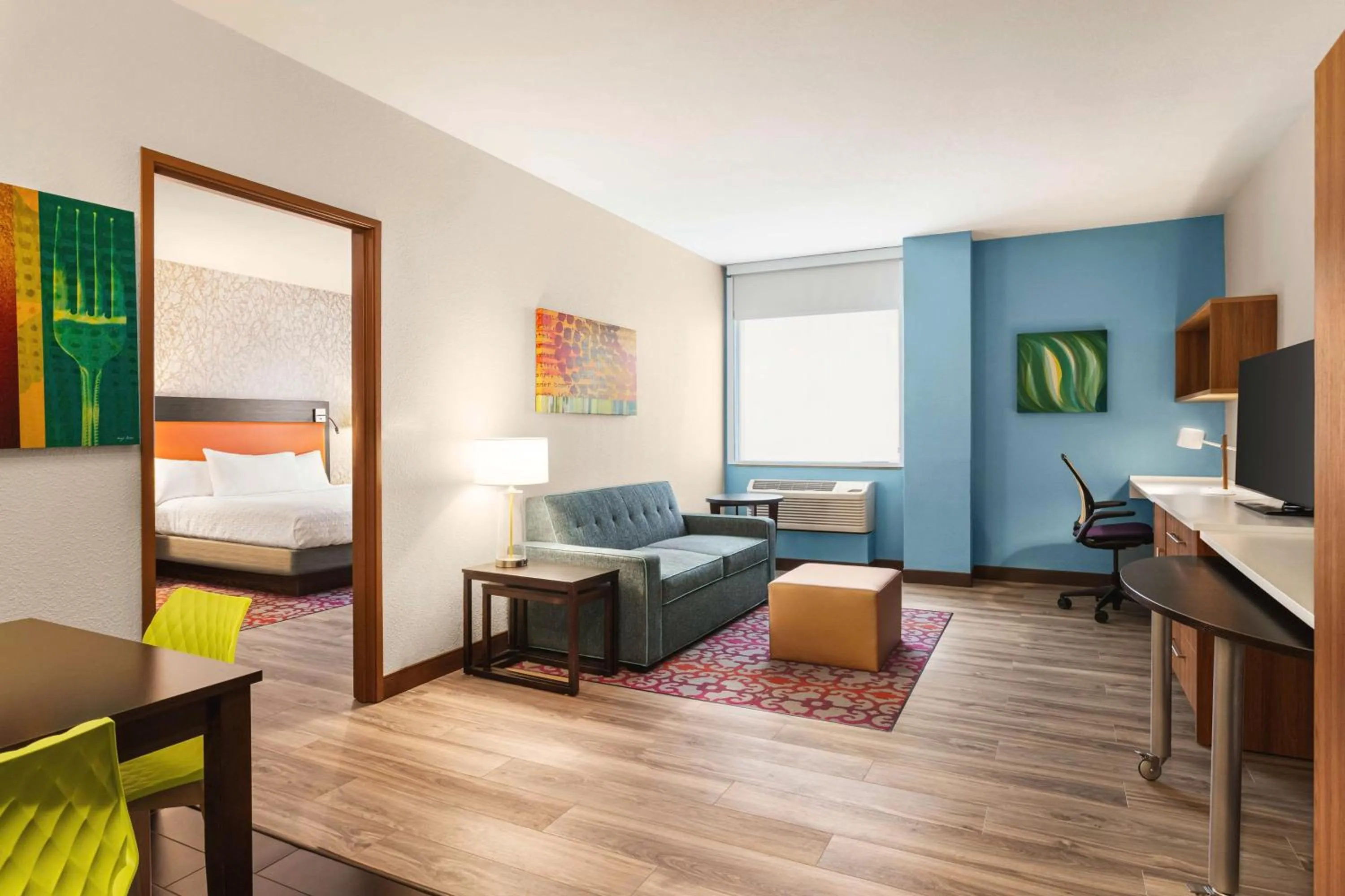 Living room, Bed in Home2 Suites by Hilton Albuquerque Downtown/University