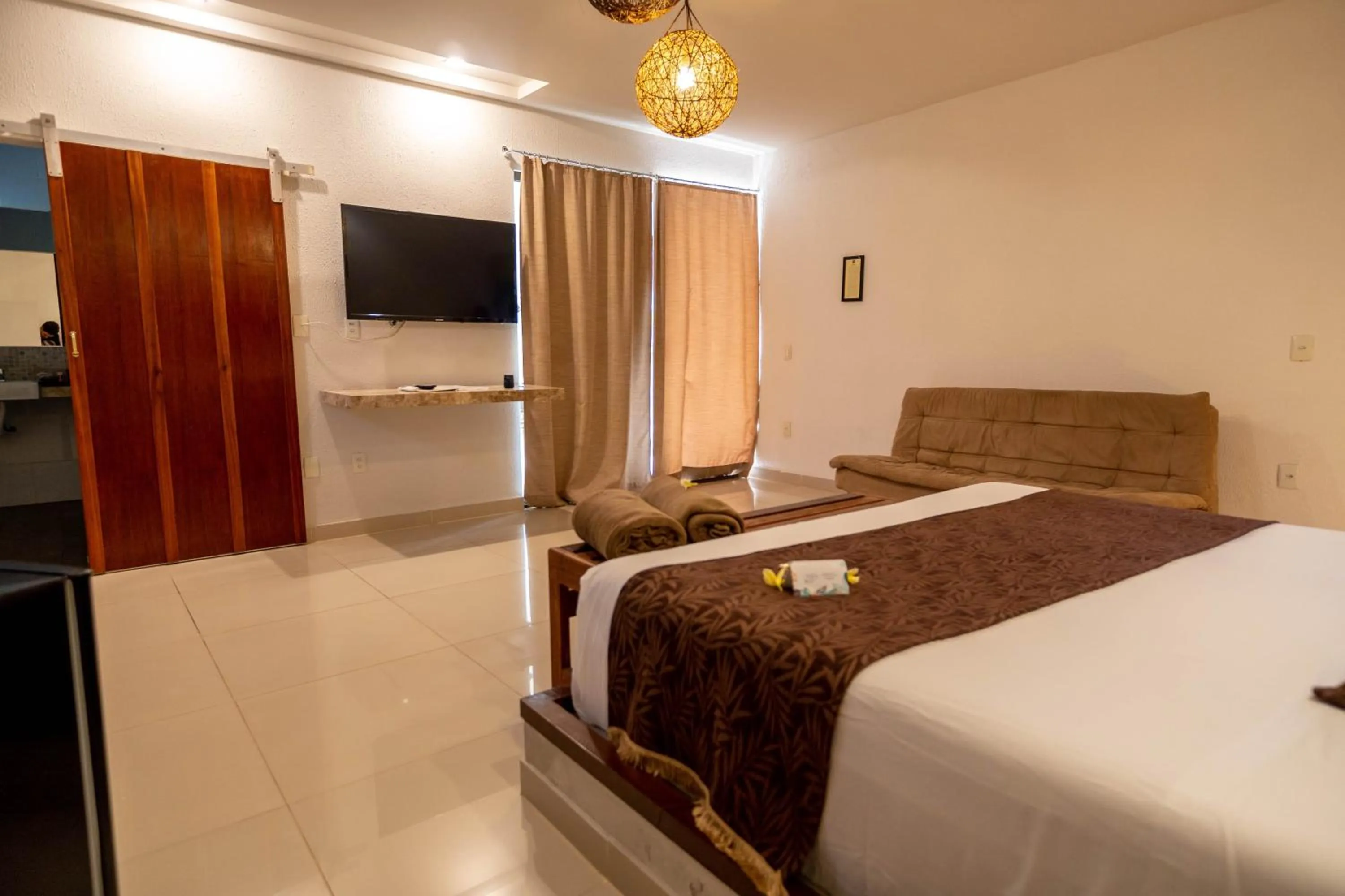 Bed in Oasis Tajaja Pousada Boutique na Costa do Conde