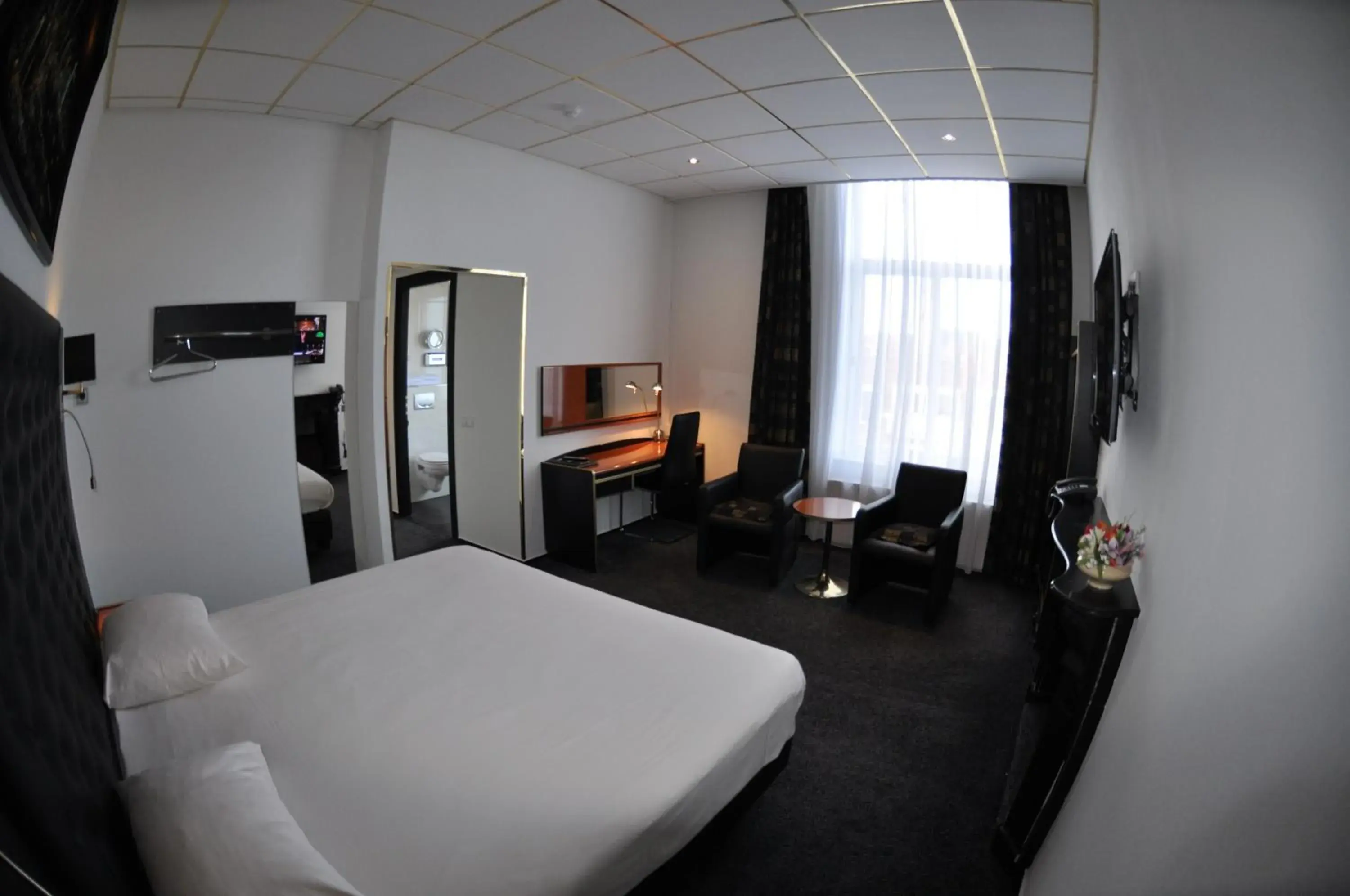 Deluxe Double Room in Hotel Le Beau Rivage Deluxe Double Room in Hotel Le Beau Rivage