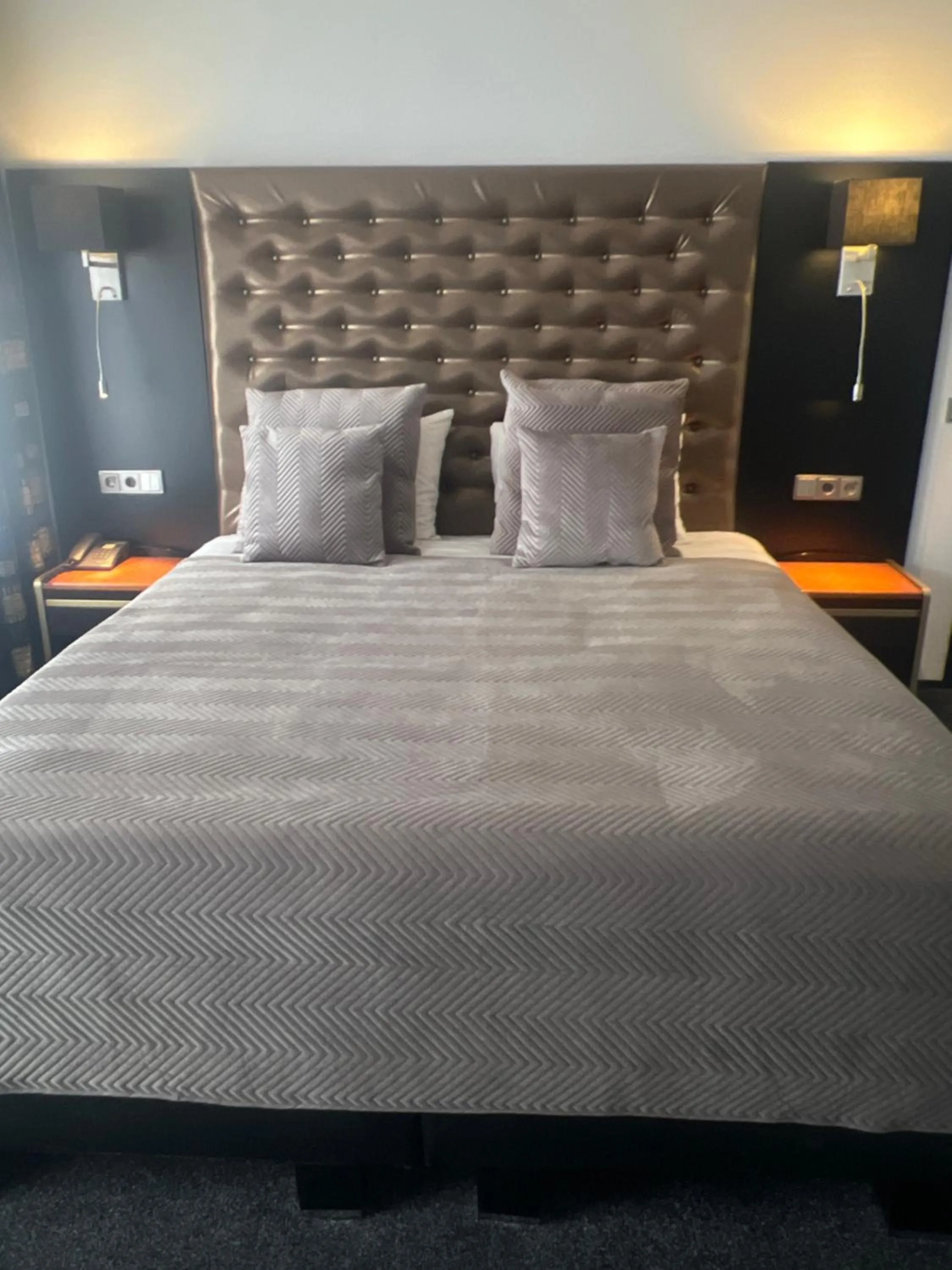 Bed in Hotel Le Beau Rivage