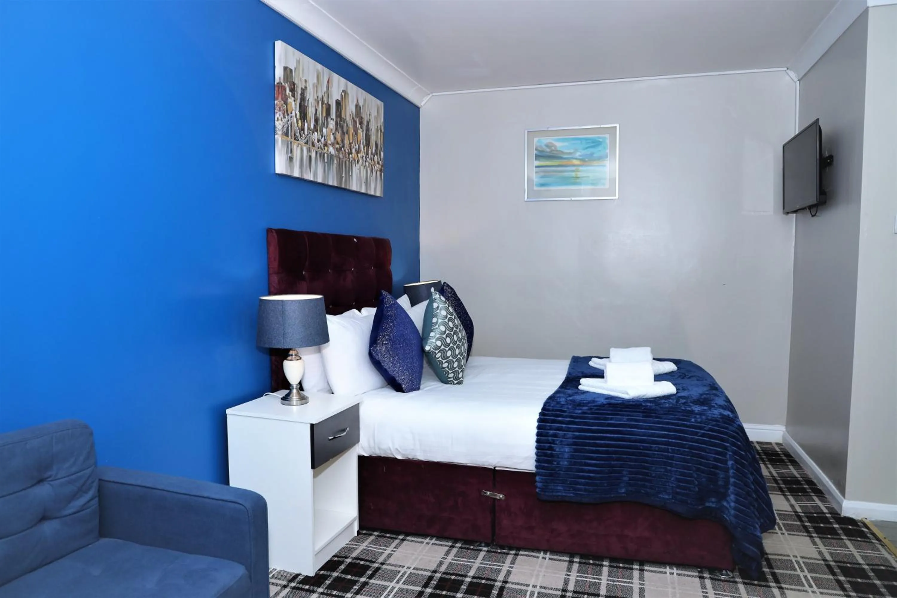 Queen Room with Garden View in 4 Sisters Inn