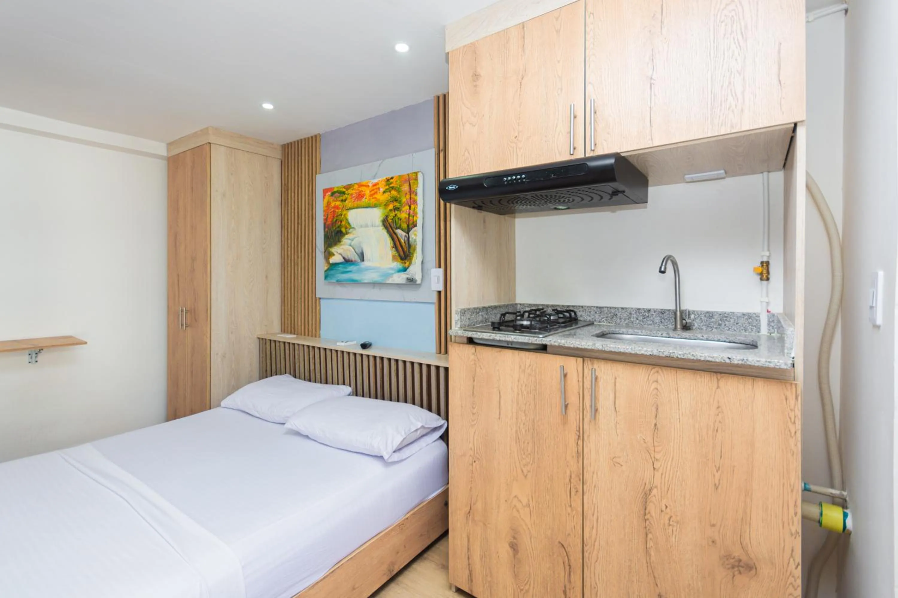 Bedroom, Bed in Hotel Lares 70 Laureles