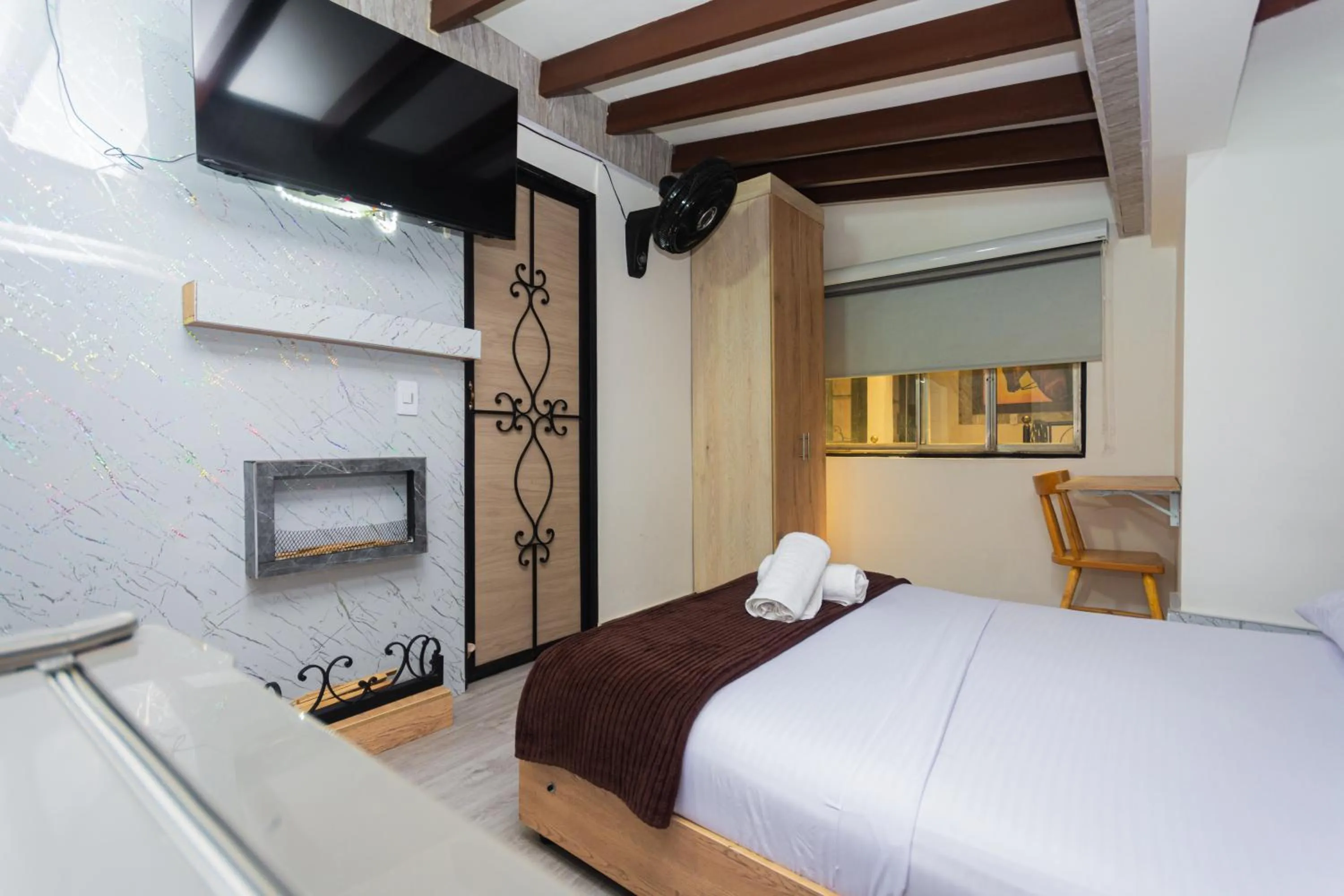 Photo of the whole room, Bed in Hotel Lares 70 Laureles