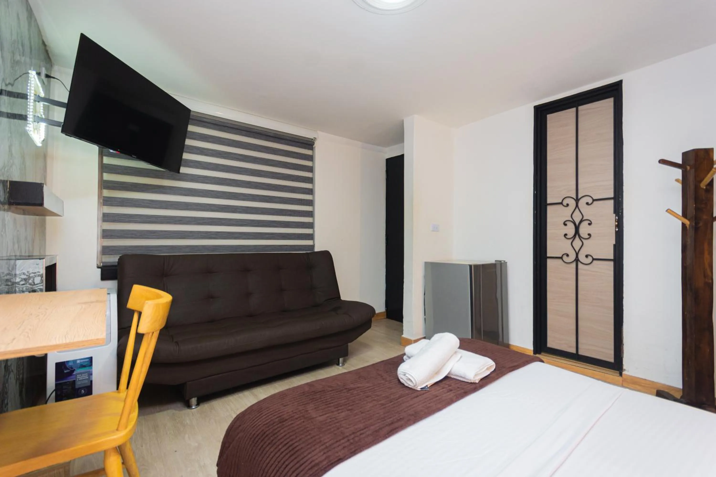 TV and multimedia, Bed in Hotel Lares 70 Laureles