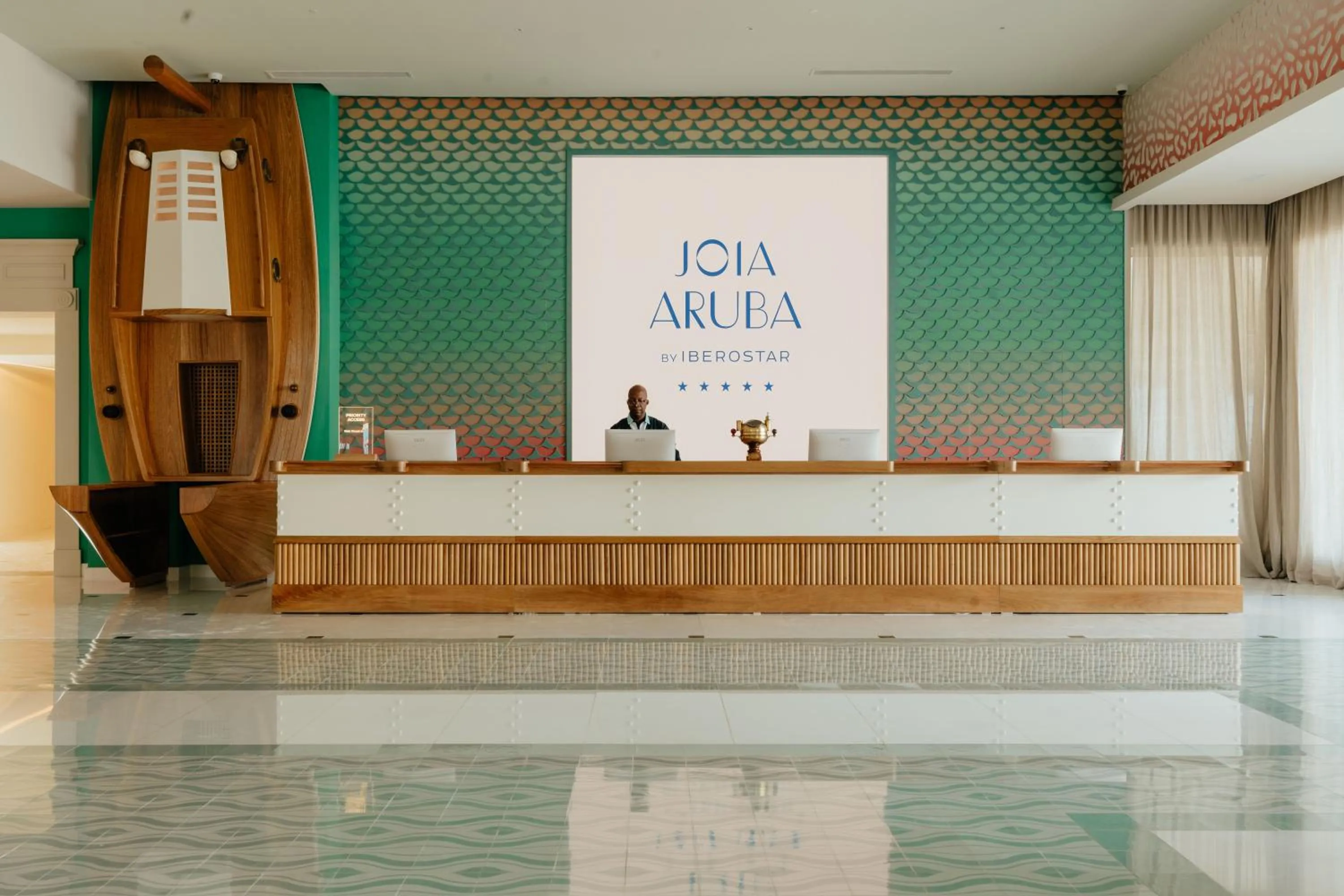Lobby or reception in JOIA Aruba by Iberostar