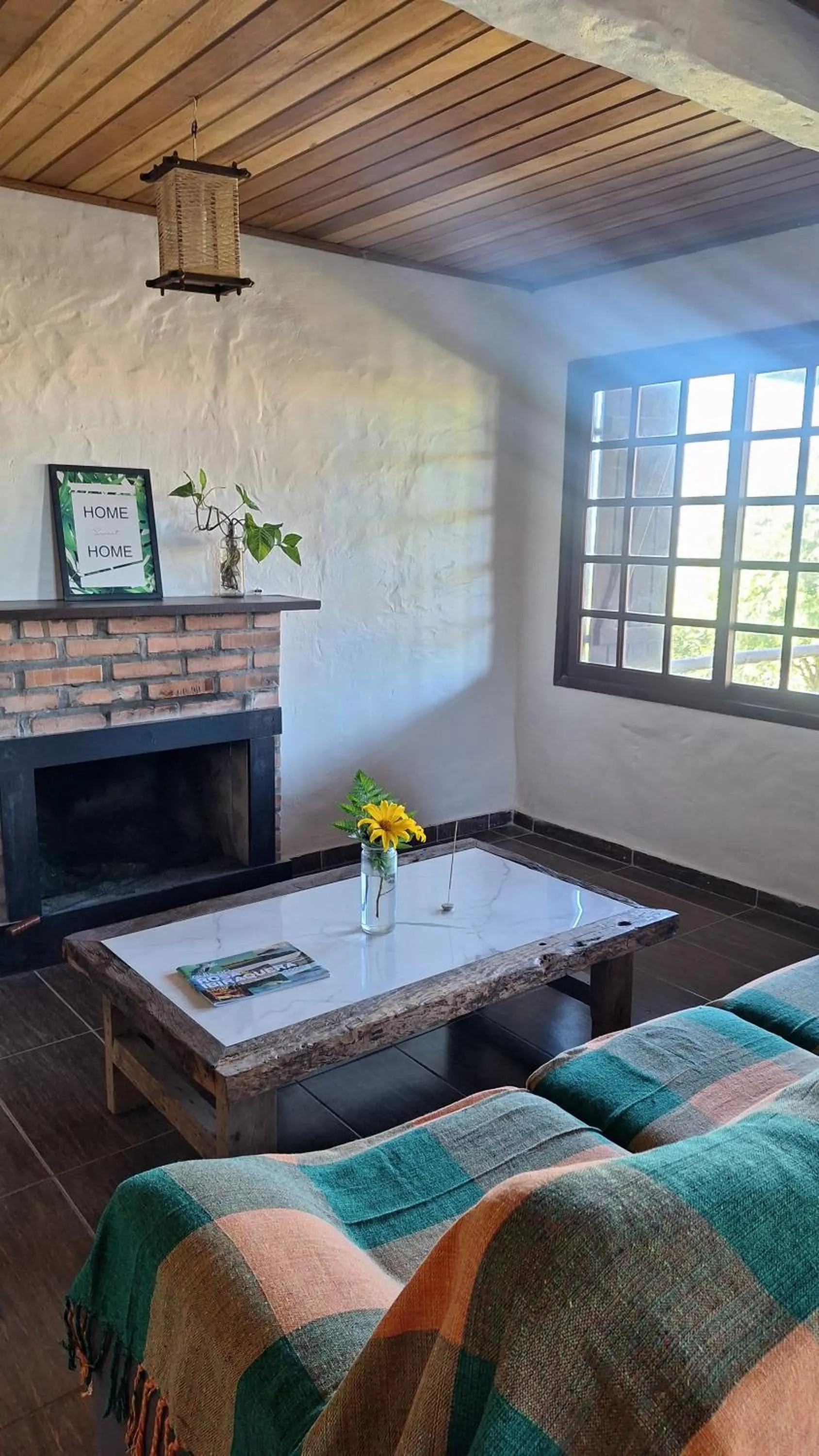 Living room in Pousada Casa Morango - Praia do Rosa - SC