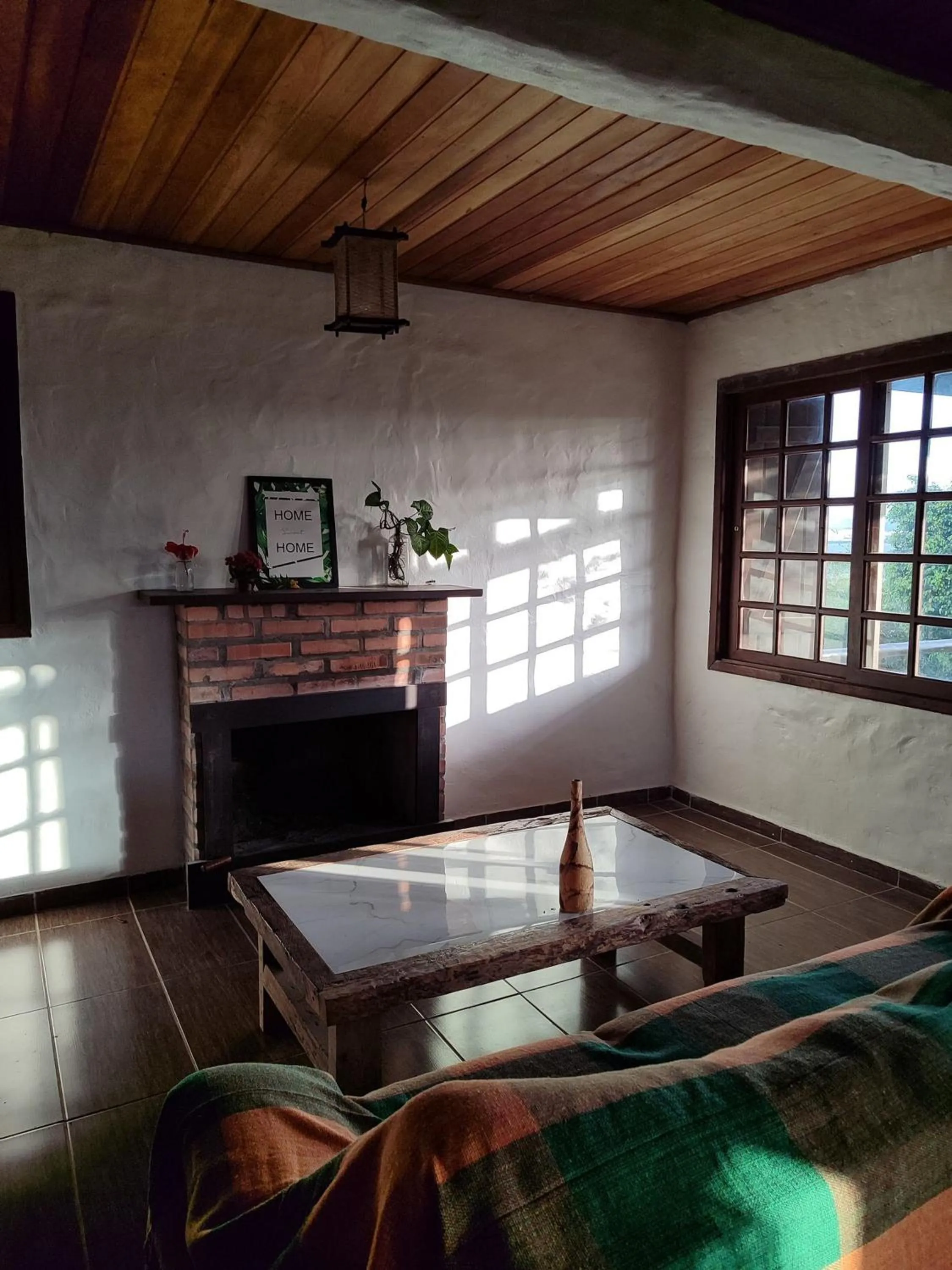 Living room in Pousada Casa Morango - Praia do Rosa - SC