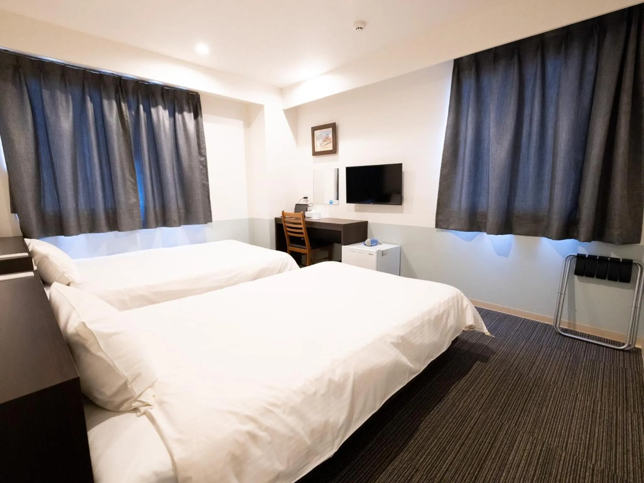 Bed in Hotel Taiyo Noen Tokushima Kenchomae