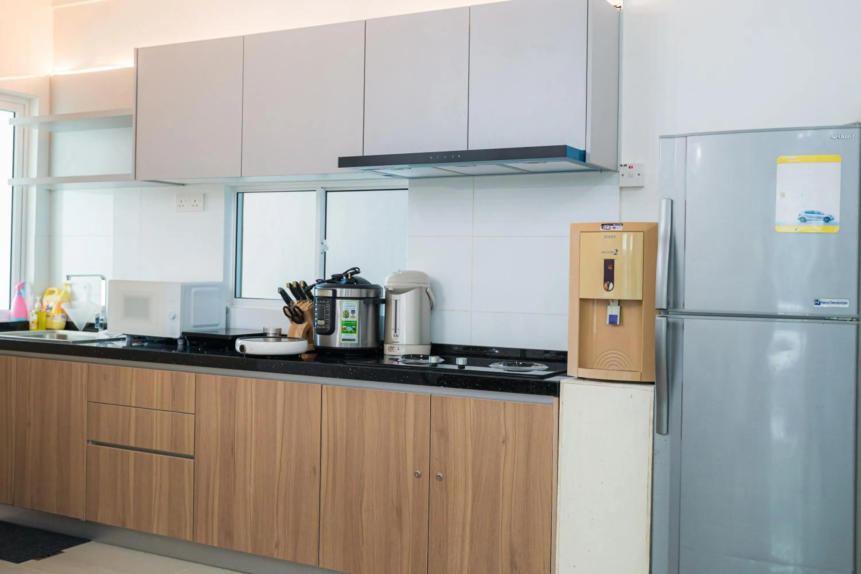 Kitchen or kitchenette in Trival Broadway Hut Homestay Sri Indah, Sandakan