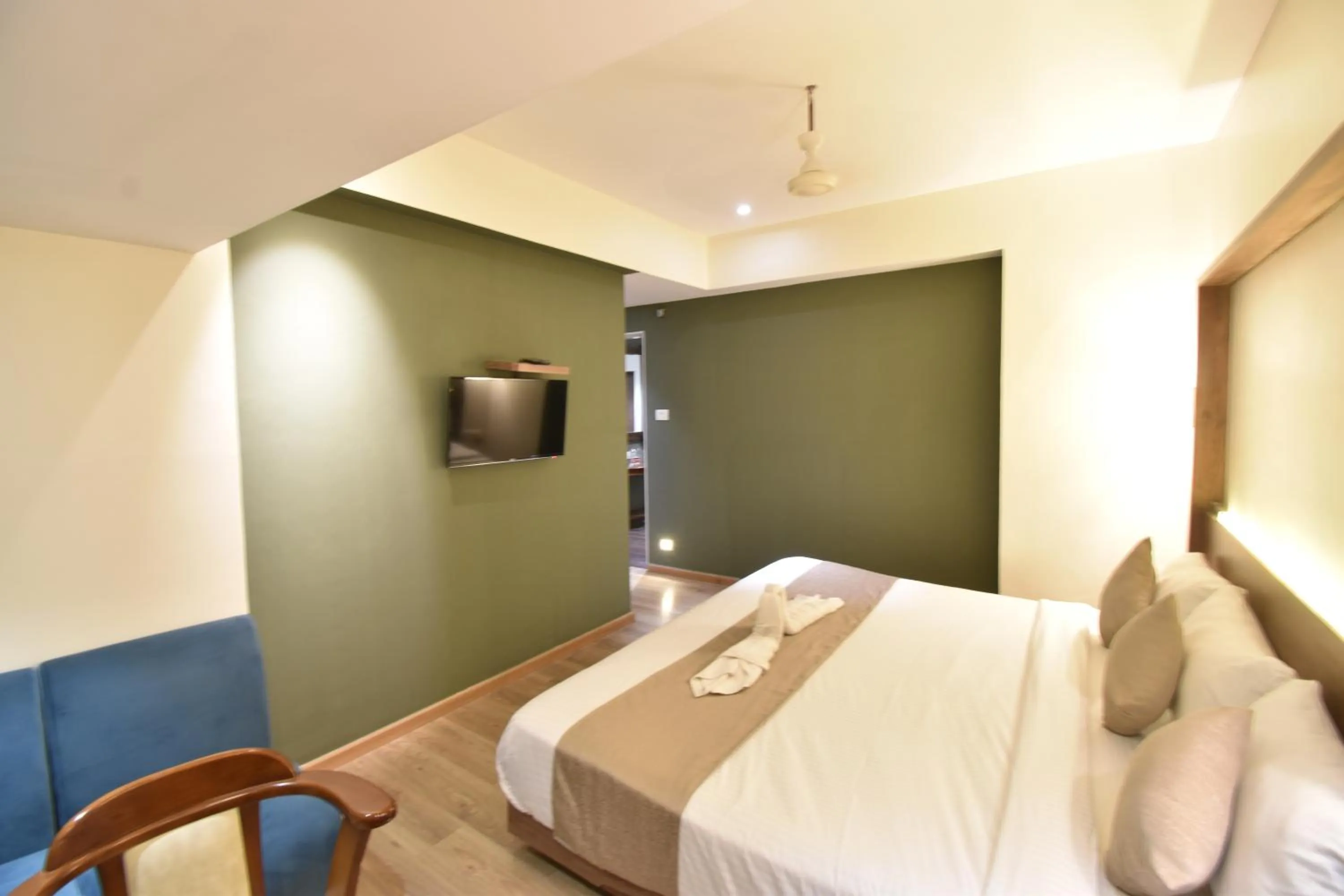 TV and multimedia, Bed in The Aarya A Smart Business Hotel