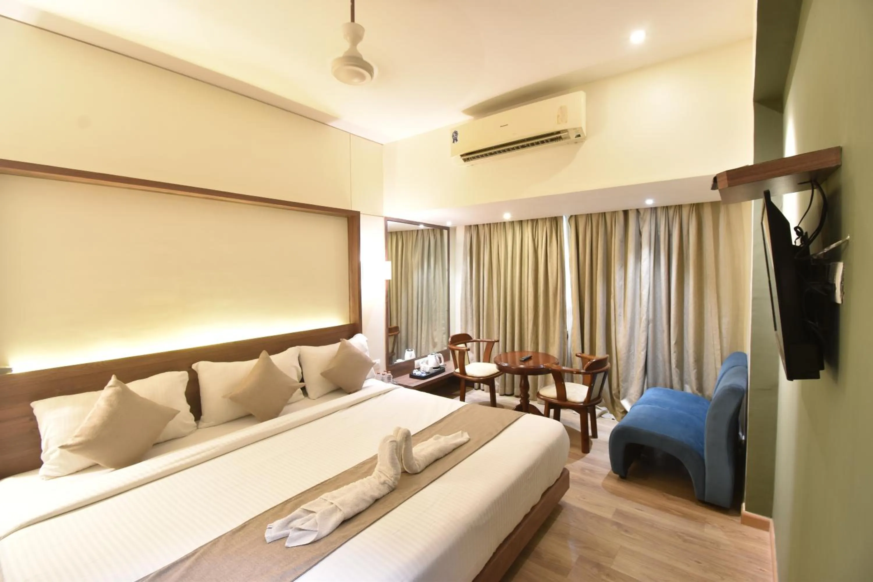 TV and multimedia, Bed in The Aarya A Smart Business Hotel