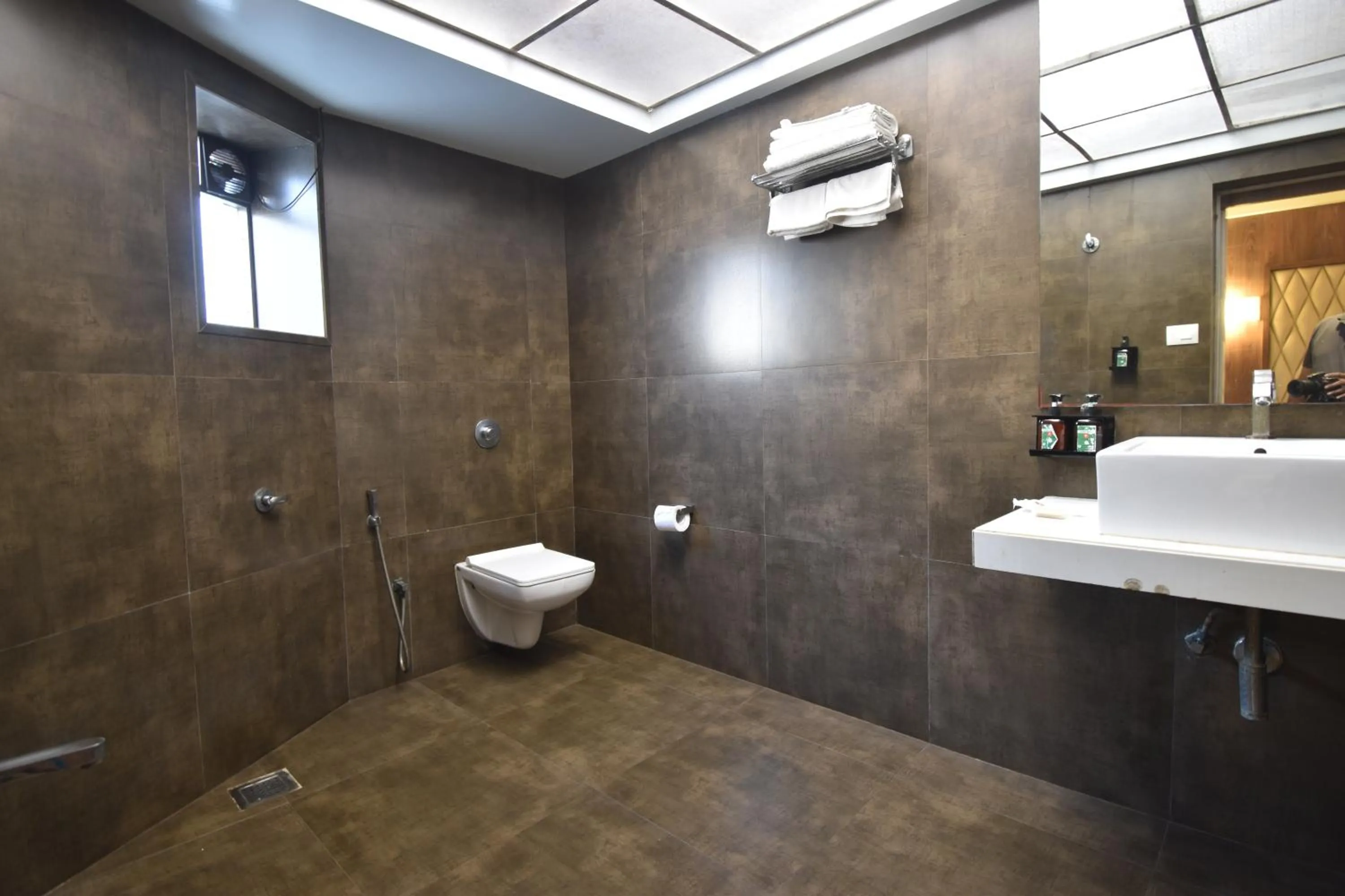 Toilet in The Aarya A Smart Business Hotel