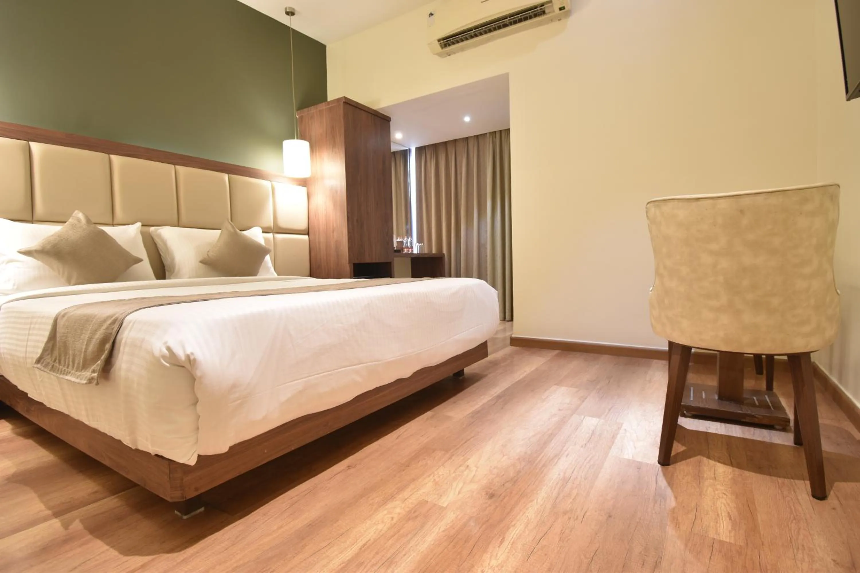 Bedroom, Bed in The Aarya A Smart Business Hotel