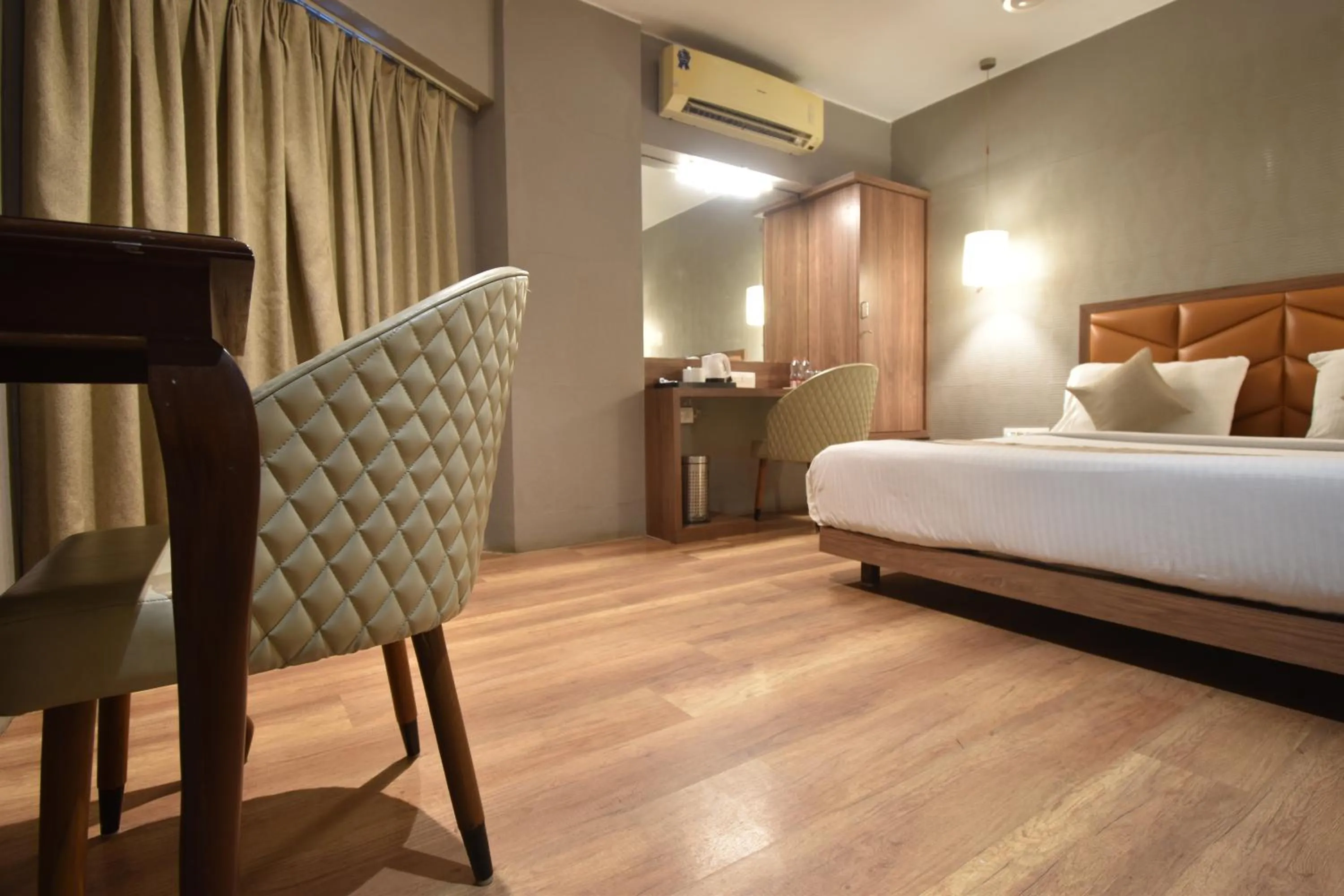 Bedroom, Bed in The Aarya A Smart Business Hotel