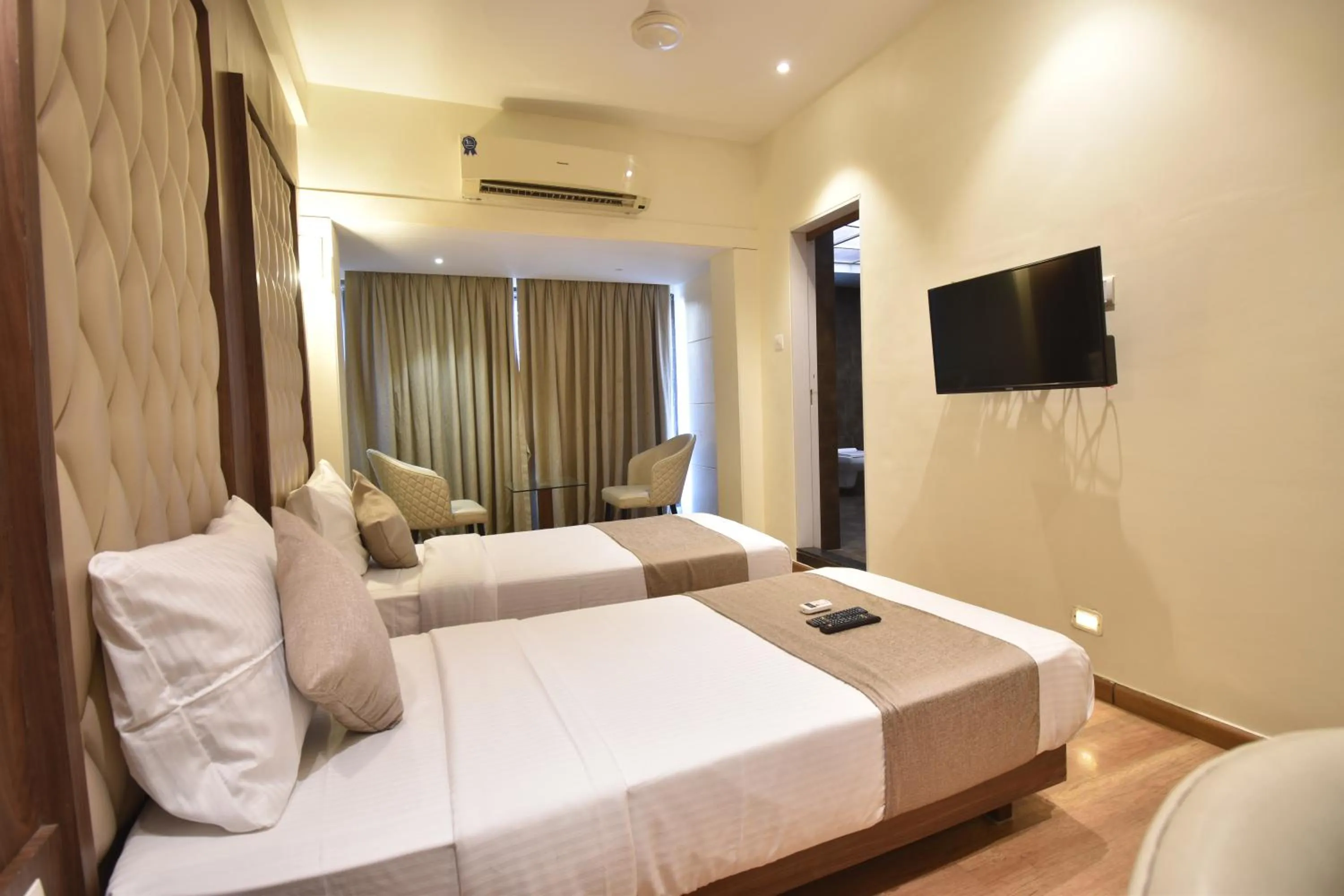 Evening entertainment, Bed in The Aarya A Smart Business Hotel