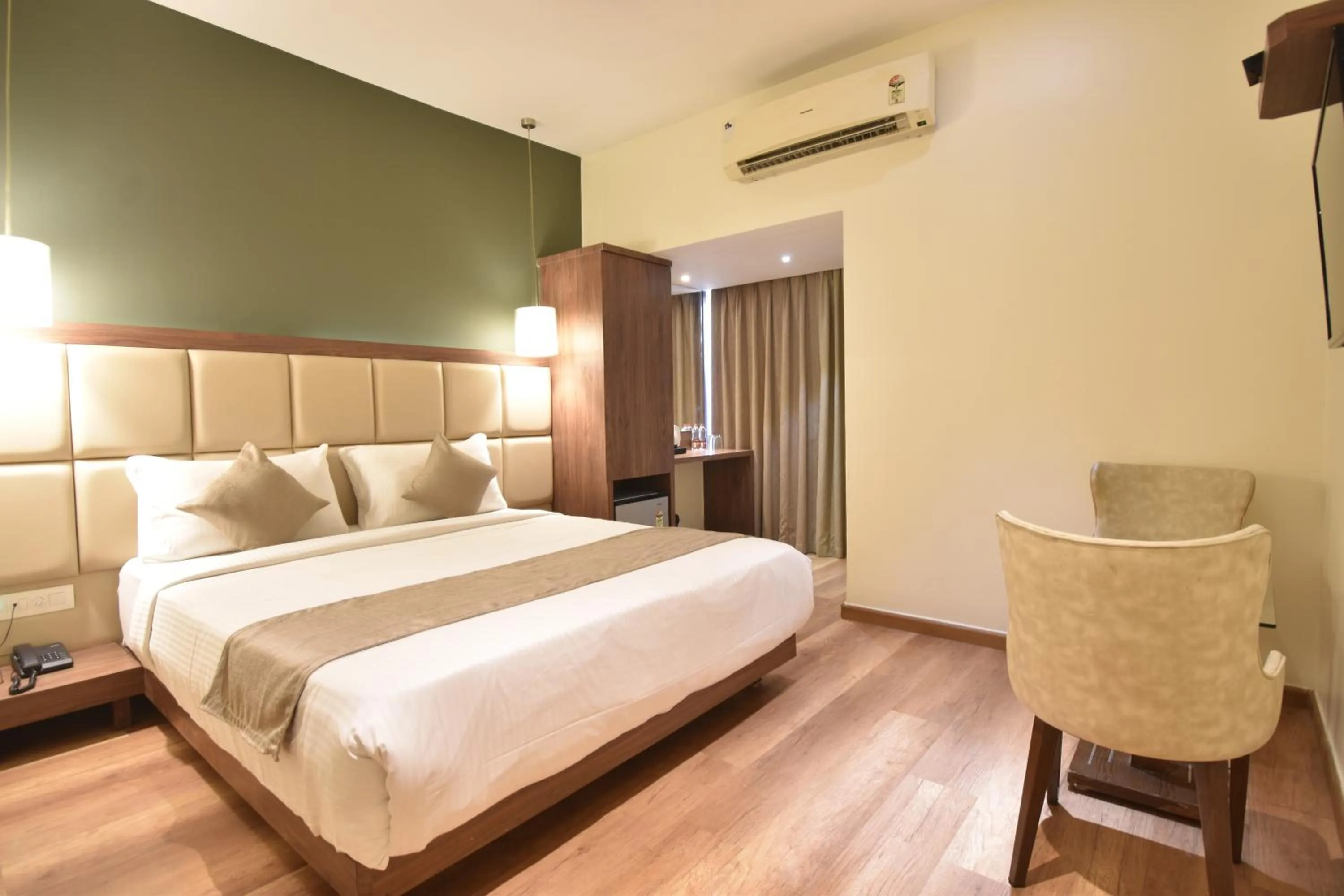 Bedroom, Bed in The Aarya A Smart Business Hotel