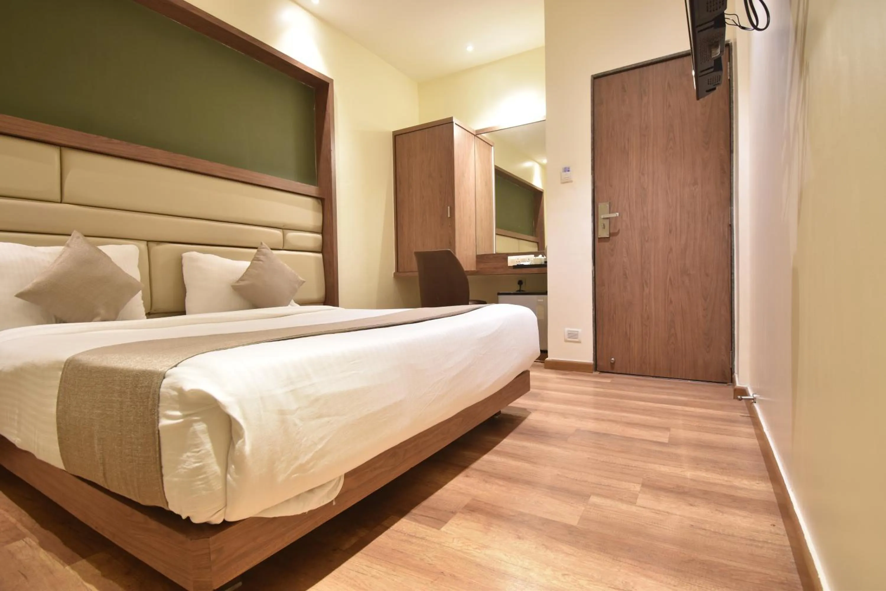 Photo of the whole room, Bed in The Aarya A Smart Business Hotel