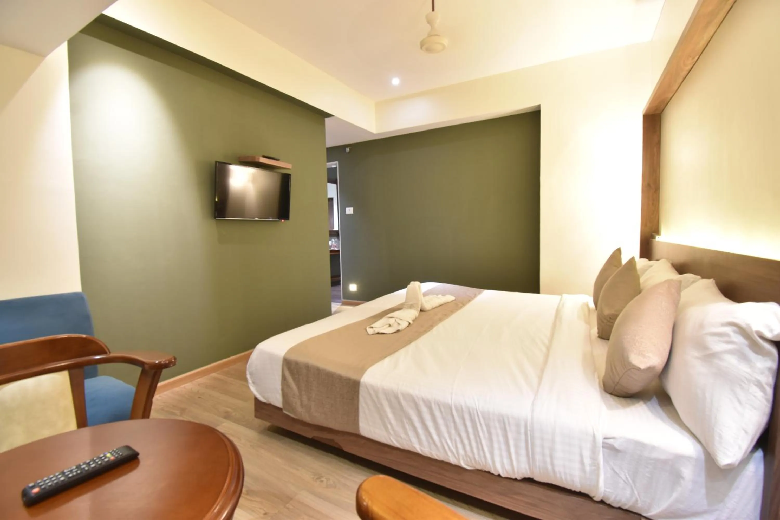 Photo of the whole room, Bed in The Aarya A Smart Business Hotel