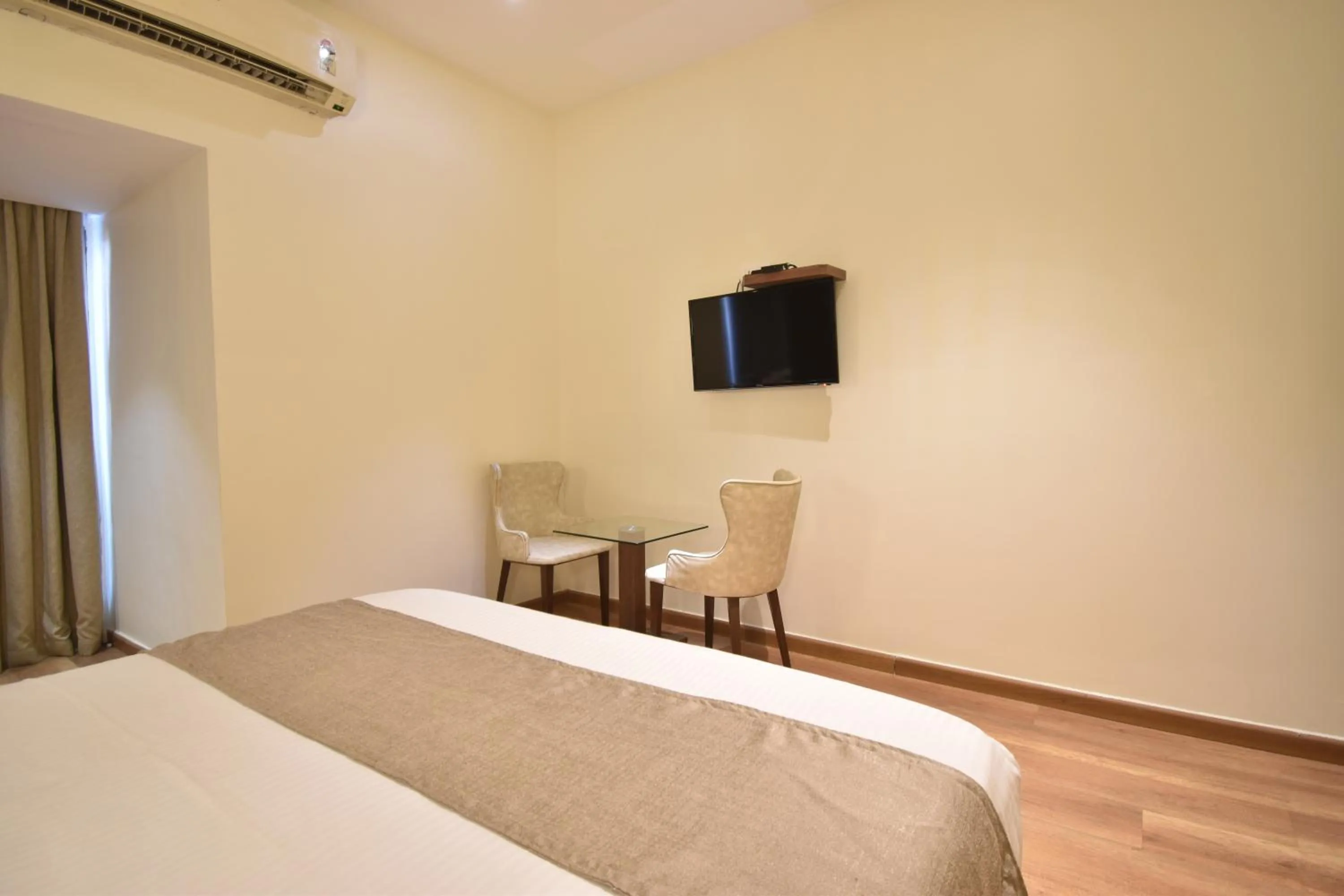 Evening entertainment, Bed in The Aarya A Smart Business Hotel