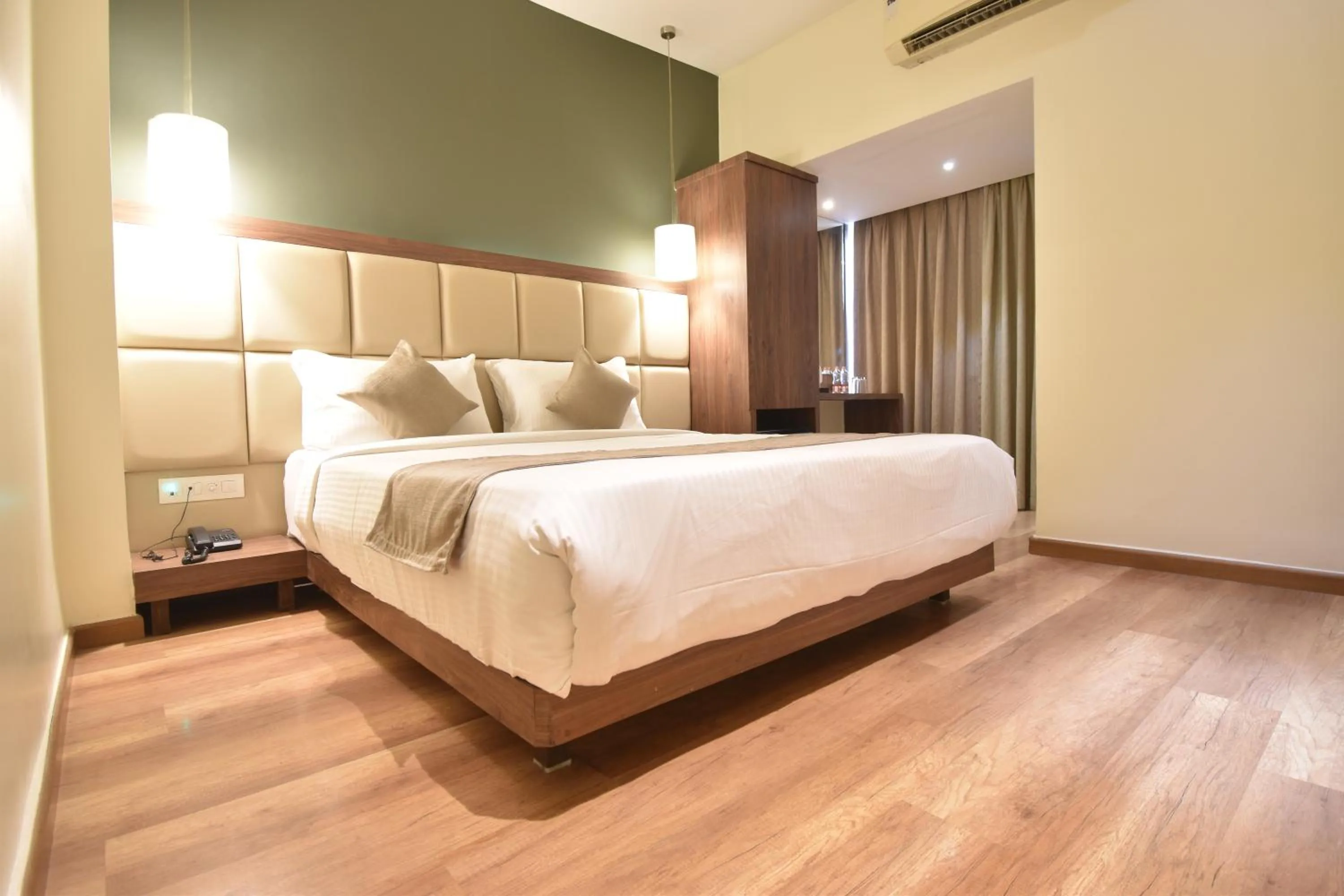 Bedroom, Bed in The Aarya A Smart Business Hotel