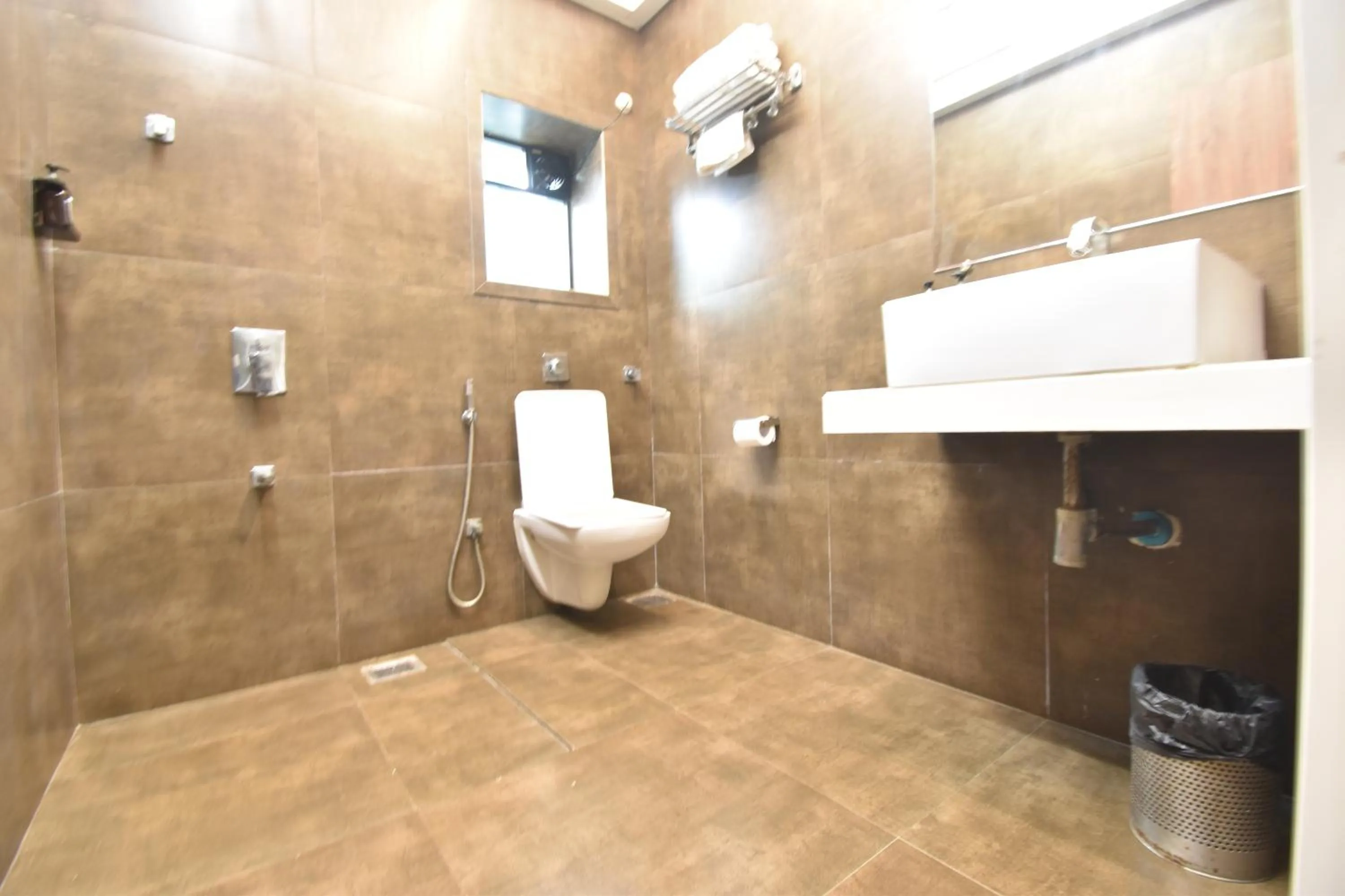 Toilet in The Aarya A Smart Business Hotel