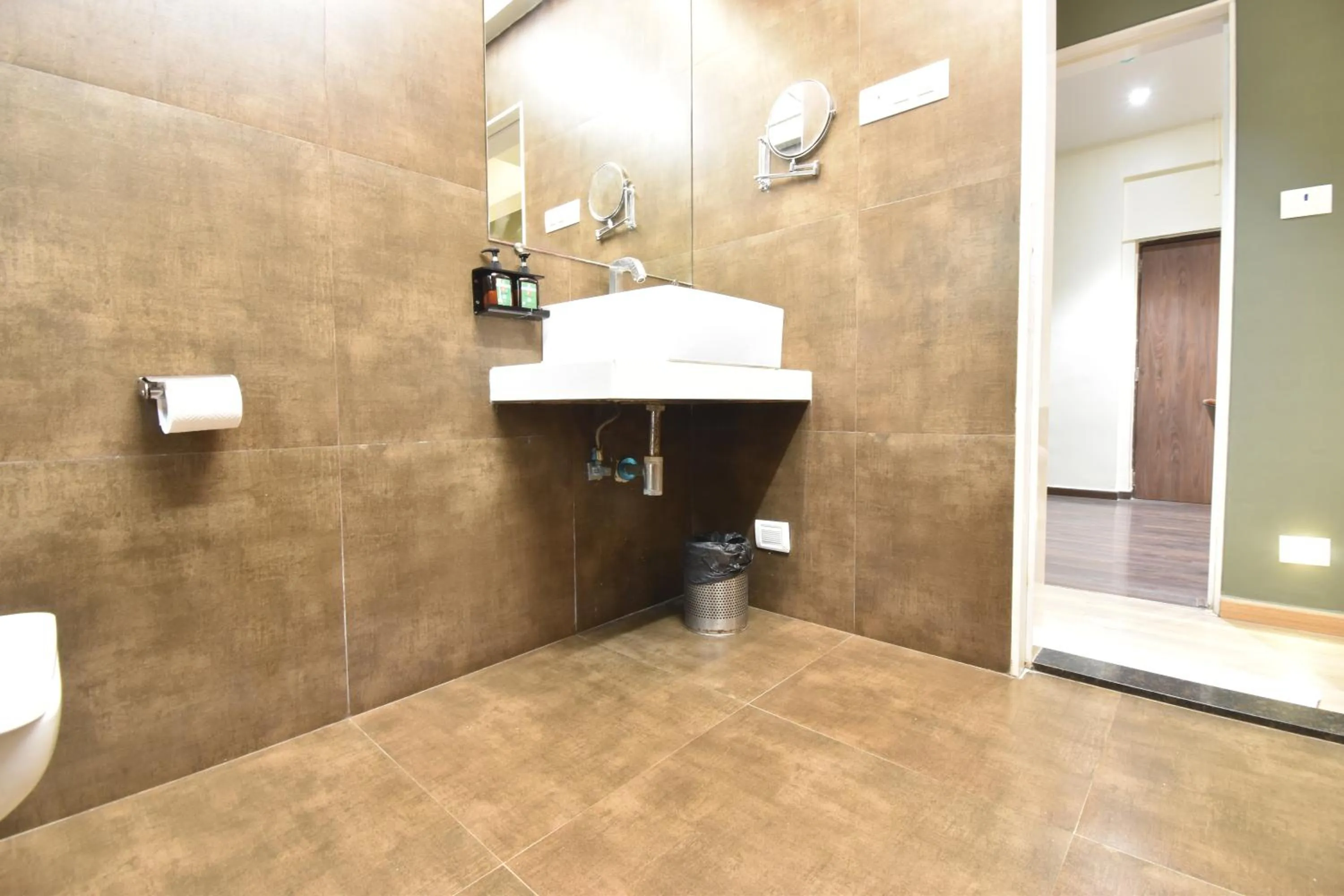 Toilet in The Aarya A Smart Business Hotel