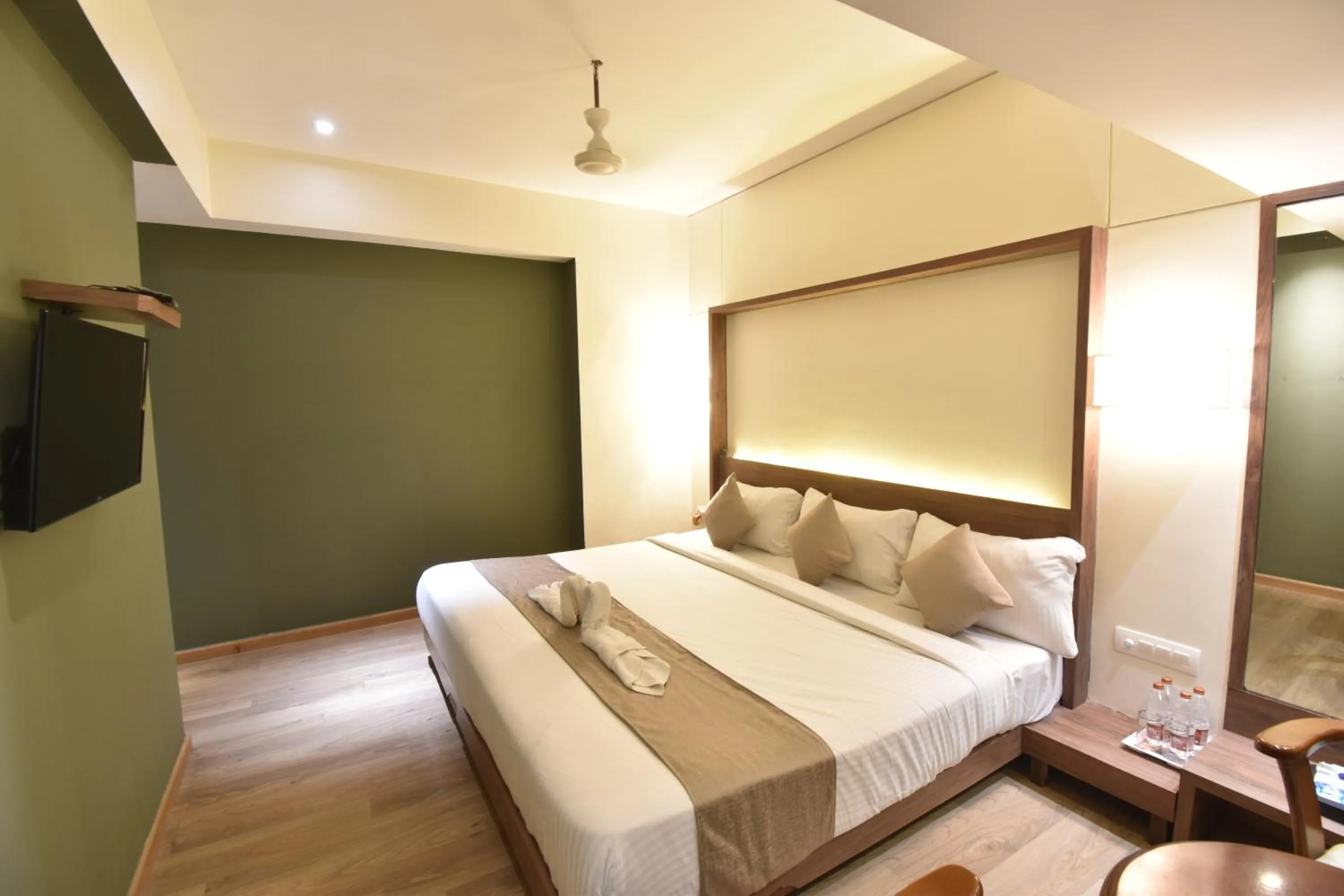 Living room, Bed in The Aarya A Smart Business Hotel