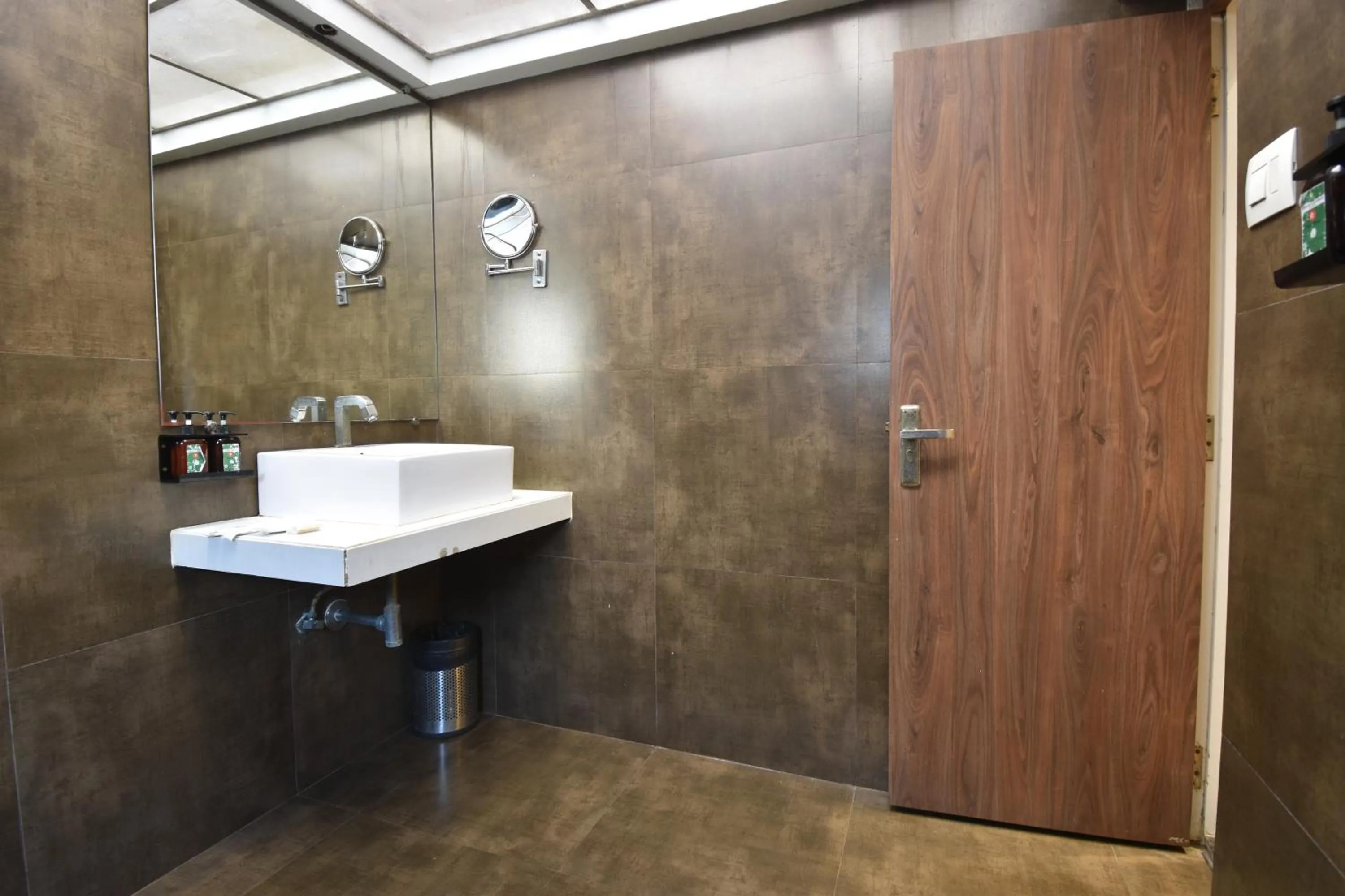 Shower in The Aarya A Smart Business Hotel
