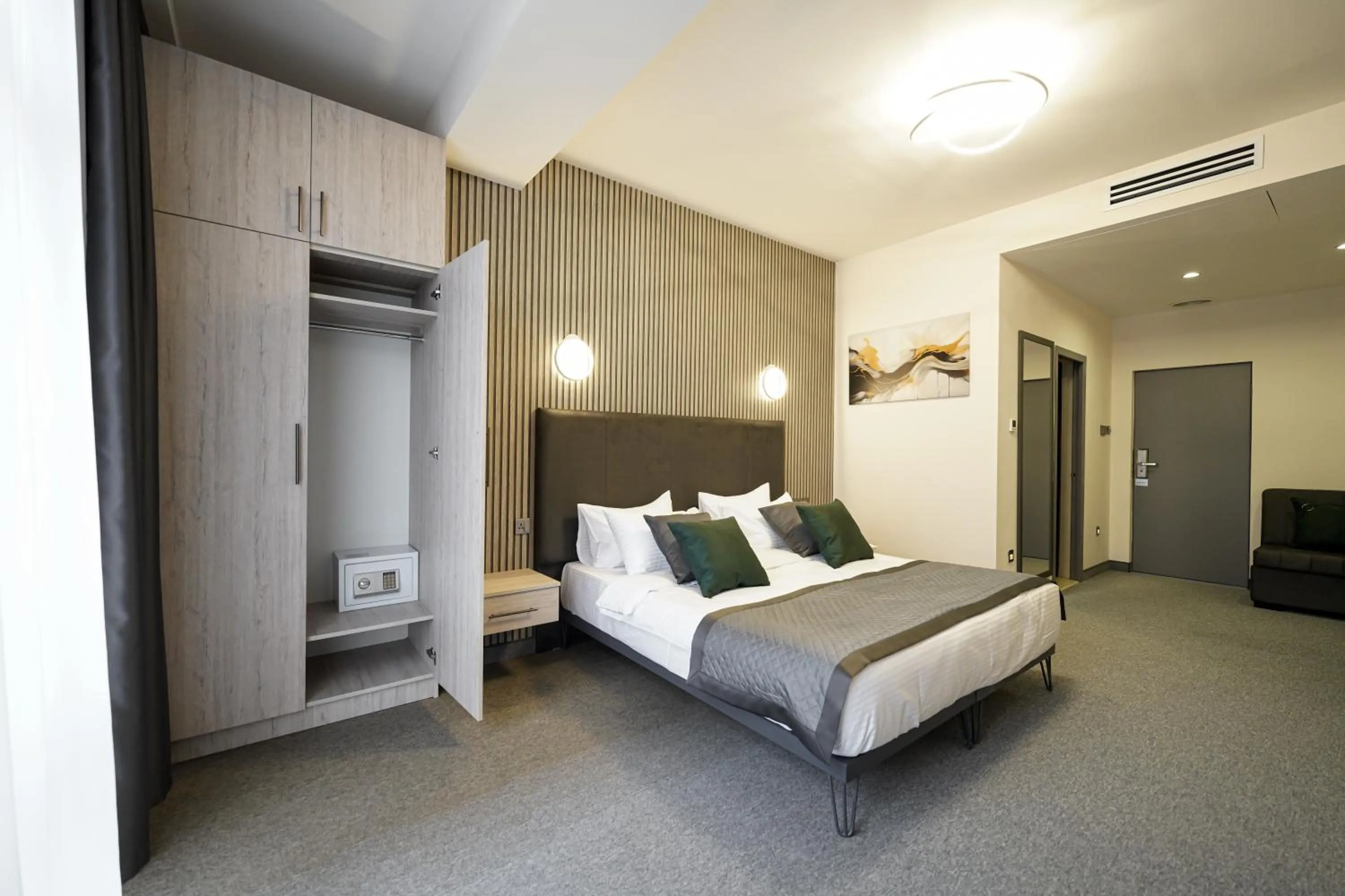 Bed in Dynasty Hotel & SPA