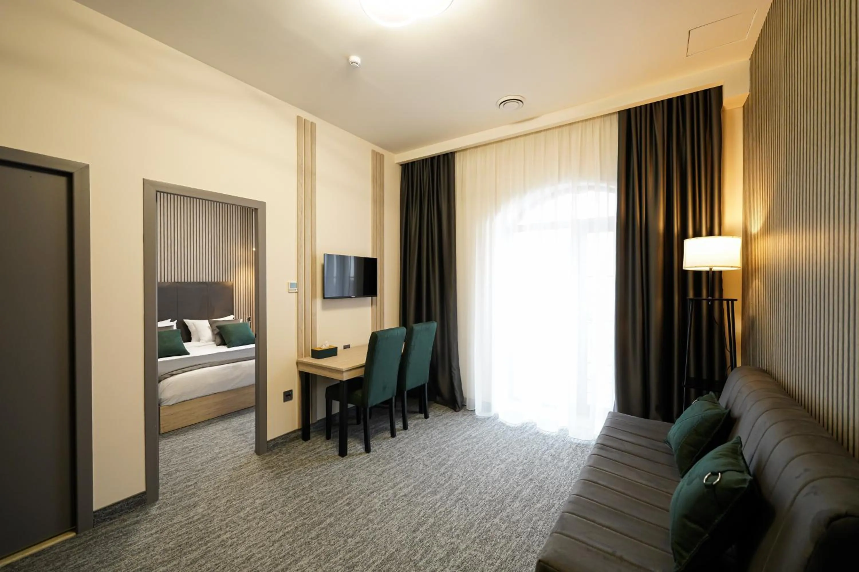 Living room, Bed in Dynasty Hotel & SPA